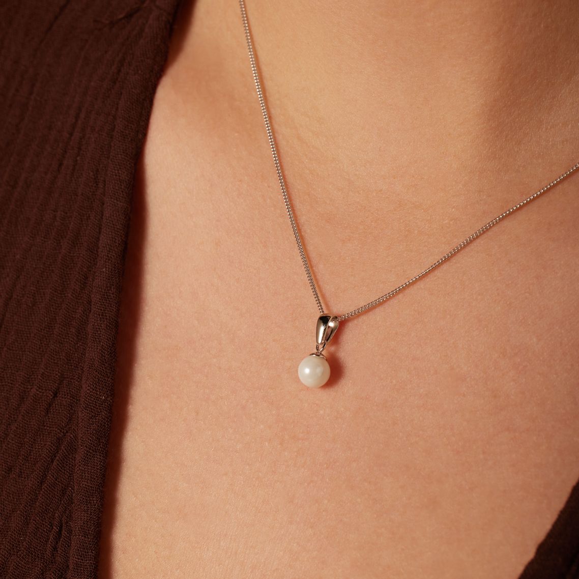 Zilveren ketting met hanger parel