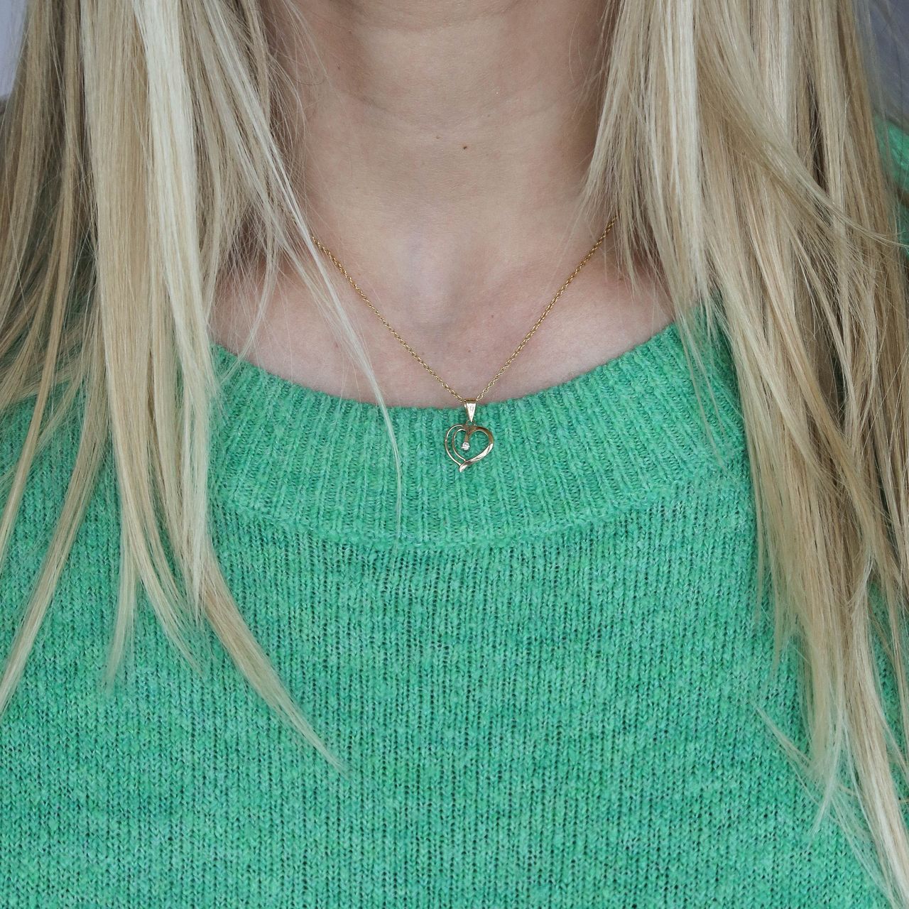 Anhänger, 585 Gelbgold, Herz mit Diamant 0,02 kt