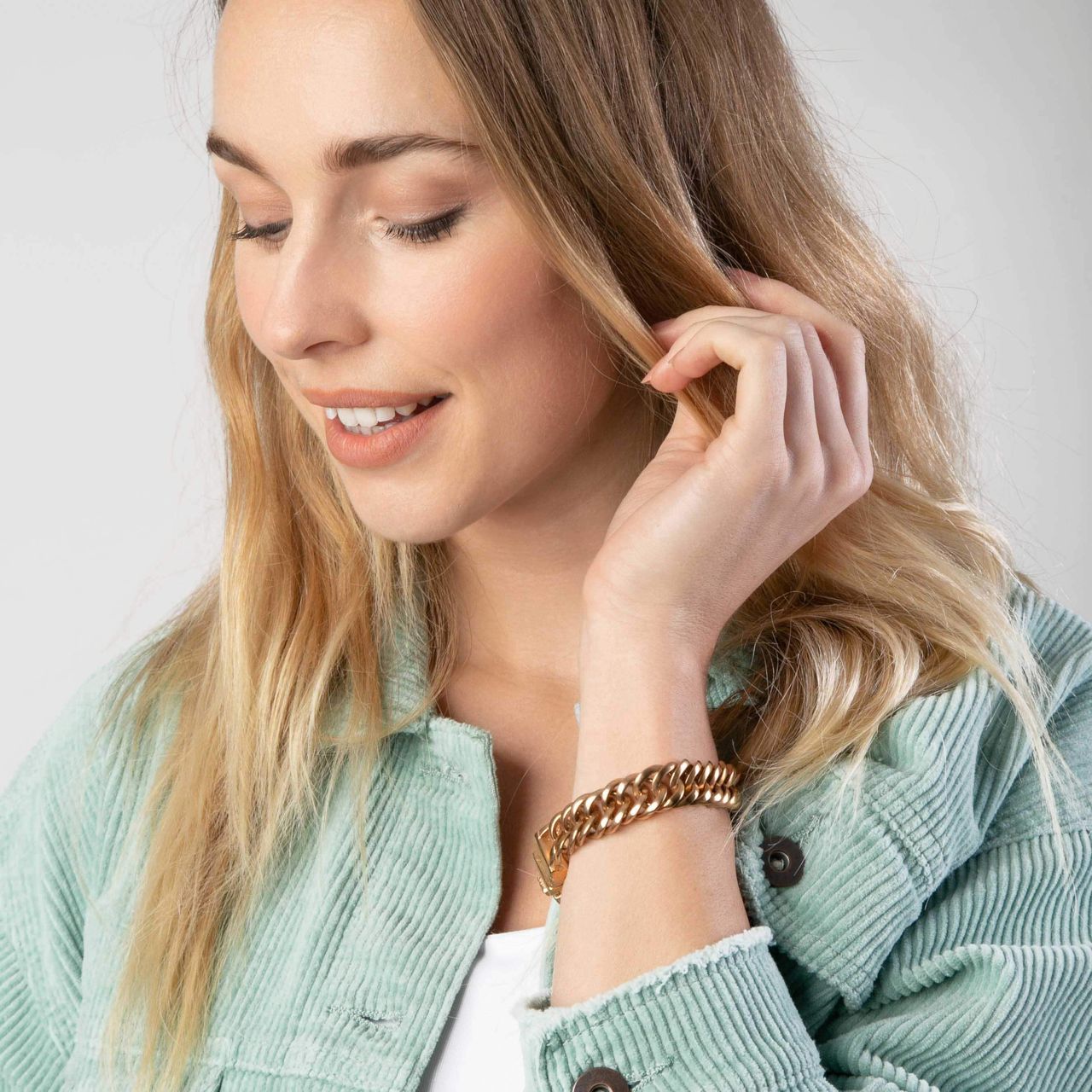 Stainless steel roséplated schakelarmband voor dames