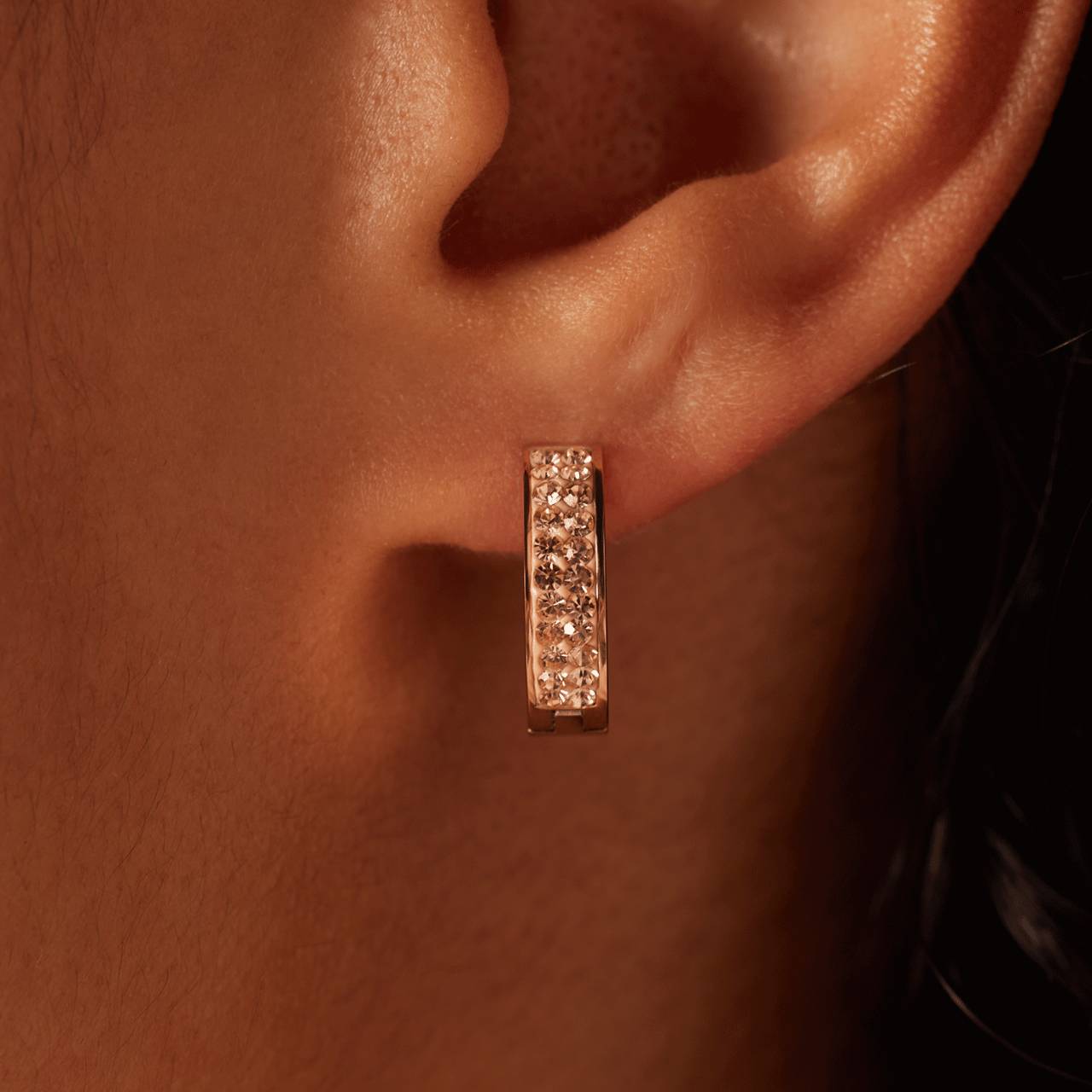 Stainless steel roséplated oorringen met rose plating en light peach kristal voor dames