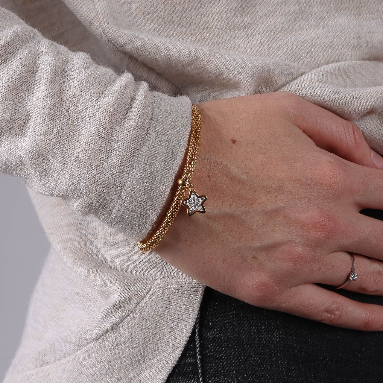 Gerecycleerd stainless steel armband mesh goldplated ster met kristal