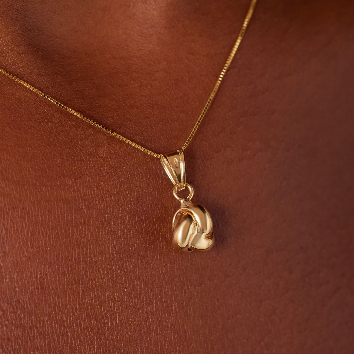 9-karätige Goldkette mit Charms Knoten