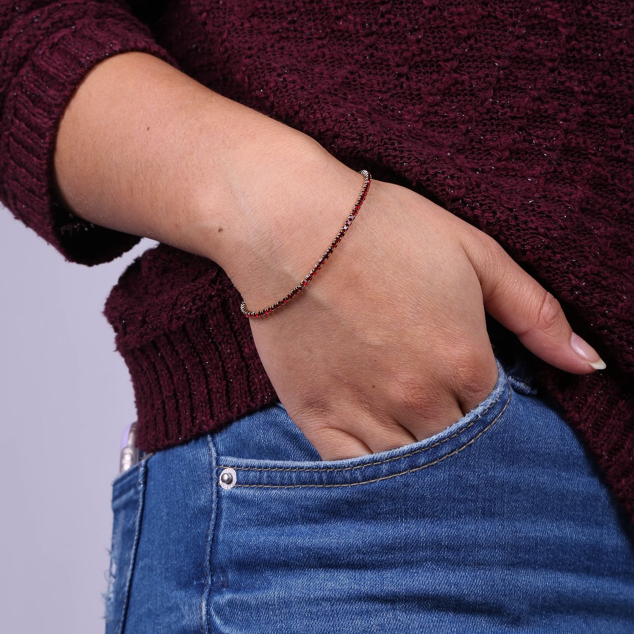 Goldplated fantasiearmband met rood kristal voor dames