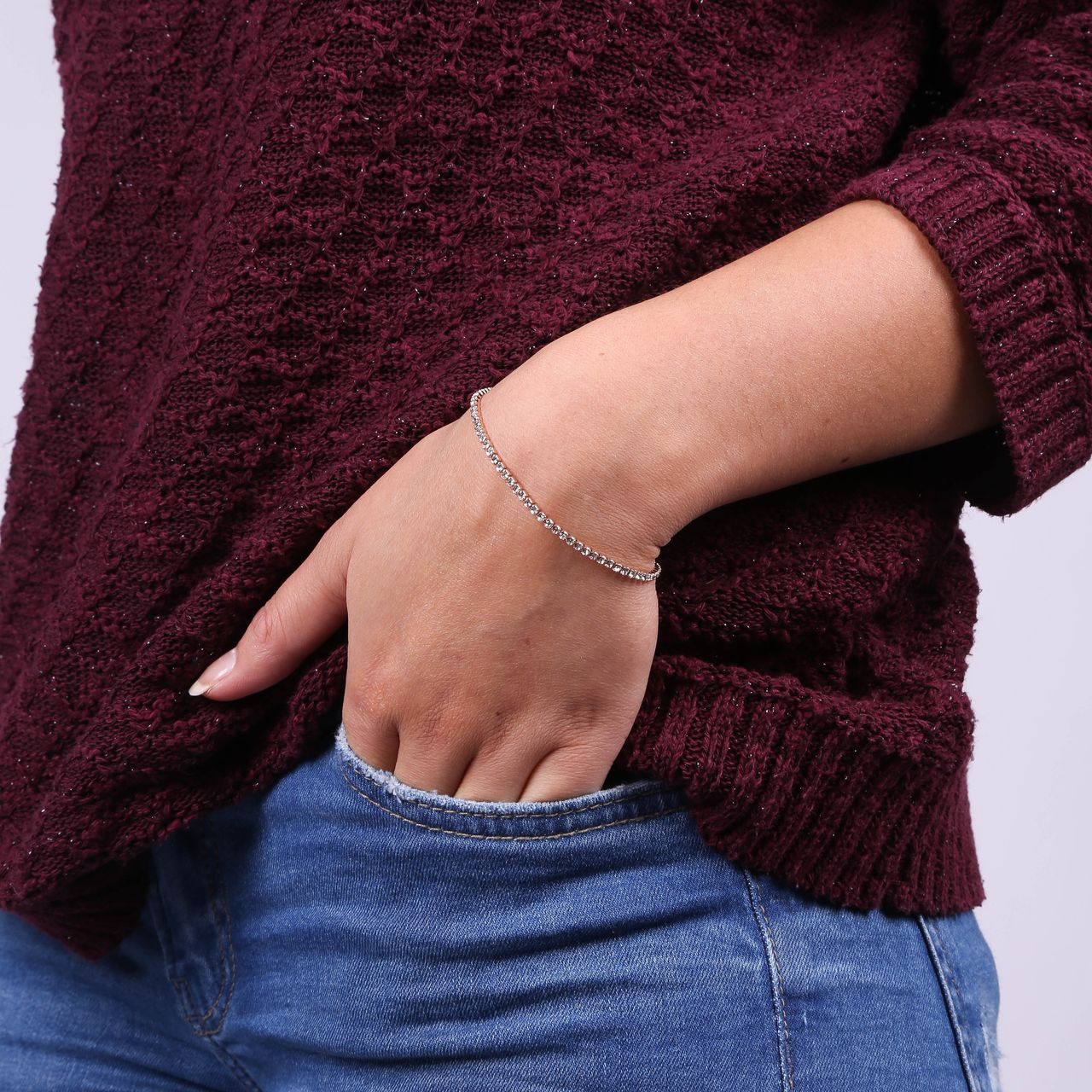 Rotvergoldetes Armband mit weißen Kristallen