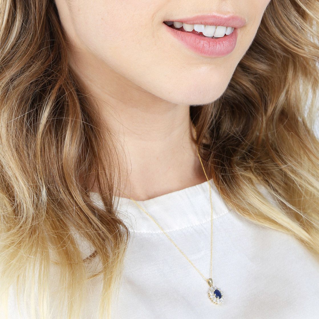 14 karaat geelgouden hanger diamant saffier 0,05ct