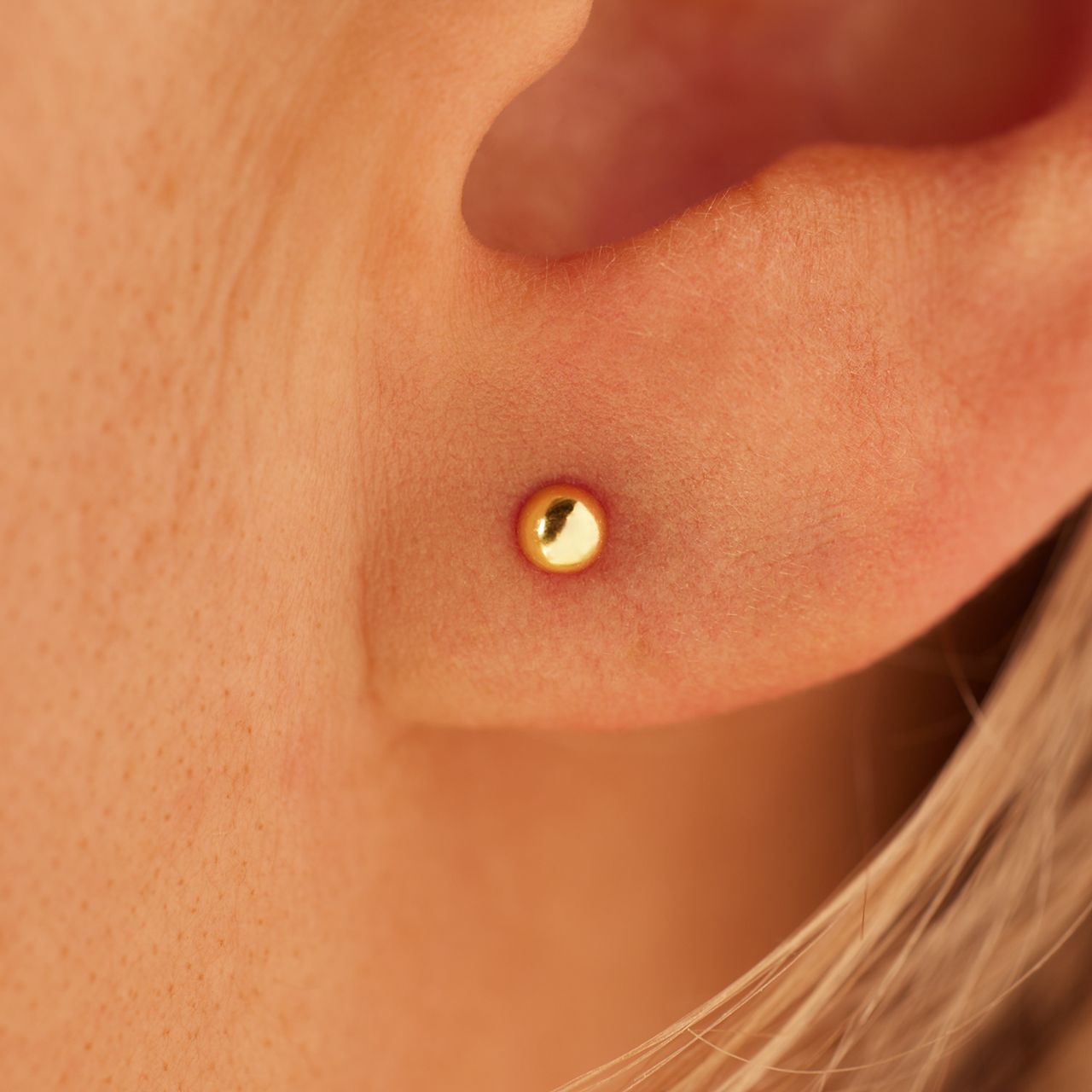 Zilveren oorknoppen bol goldplated 3mm voor dames