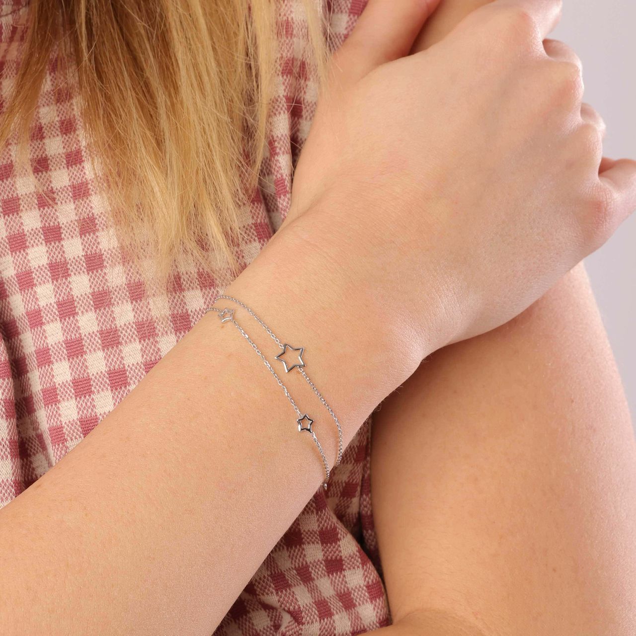 Zilveren armband rhodiumplated open ster