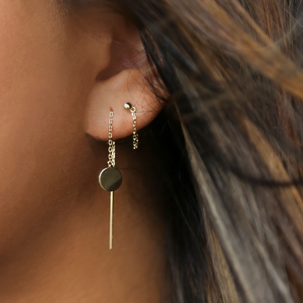 Zilveren oorbellen goldplated disc