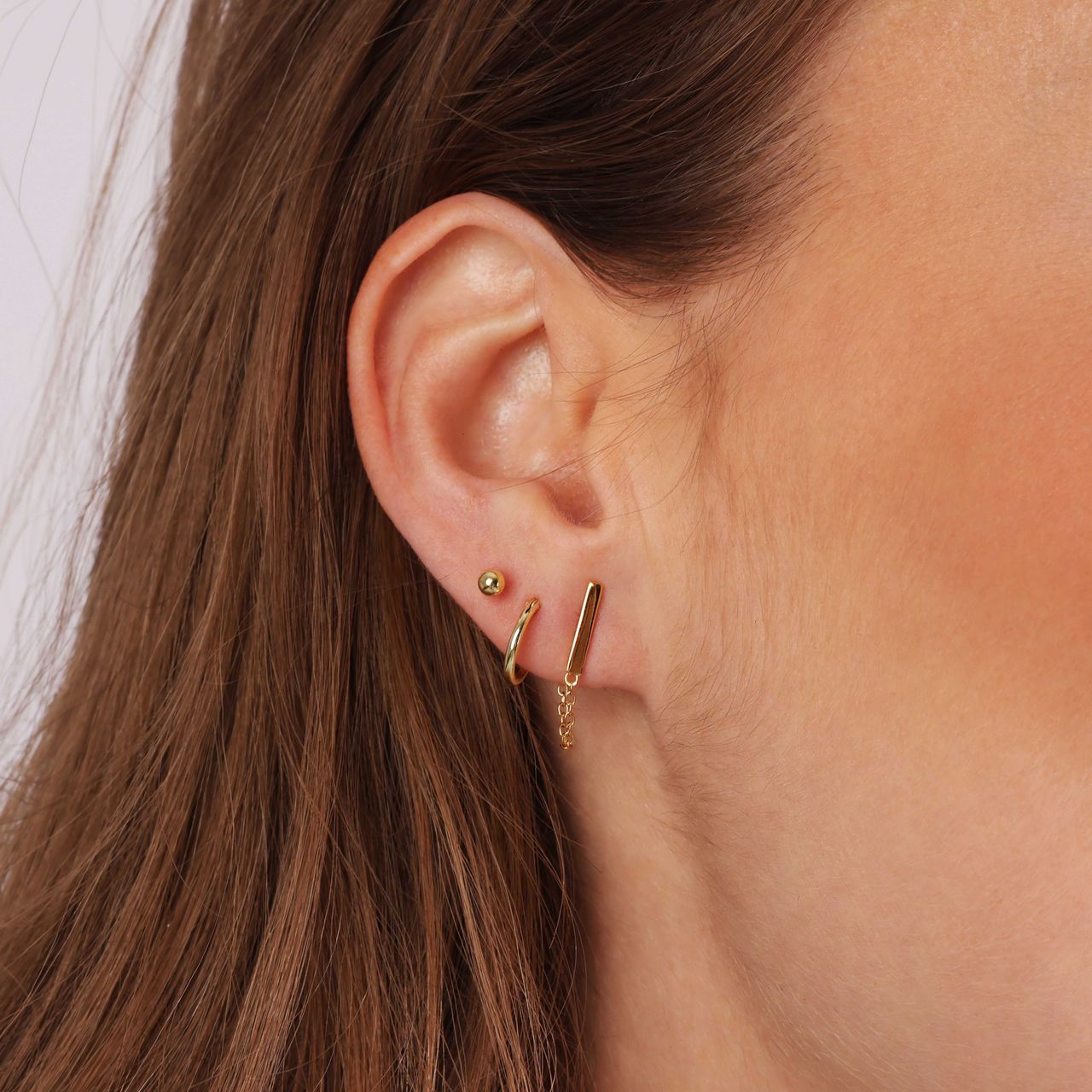 Zilveren goldplated oorknoppen bar voor dames