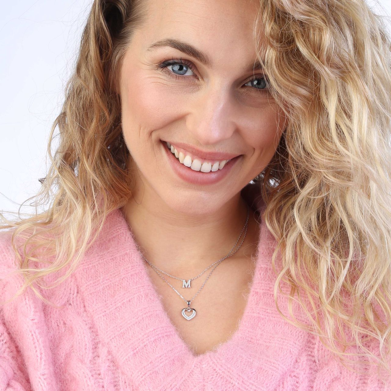 Silberne Halskette und Anhänger doppeltes Herz mit Zirkonia