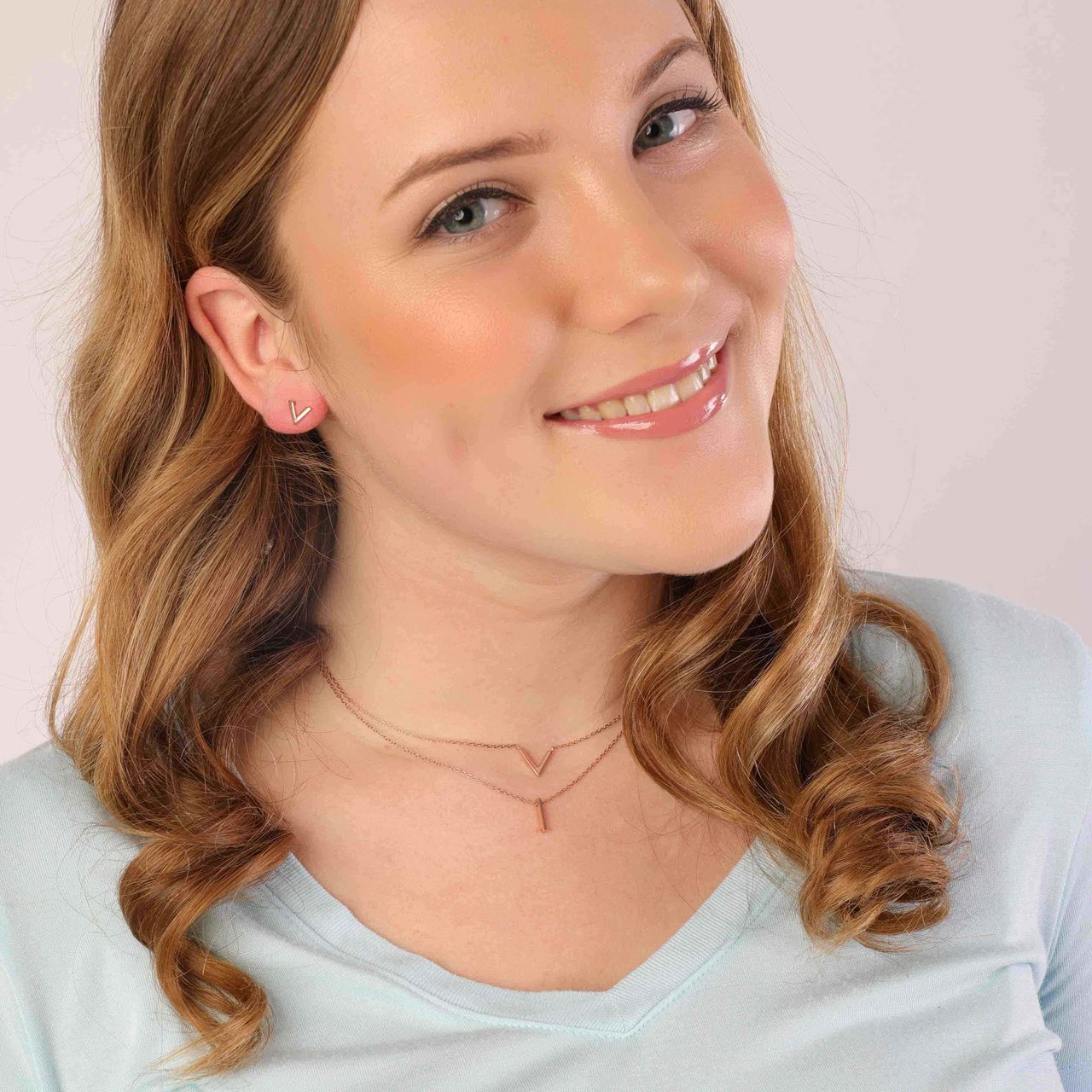 Silbernes Set mit rotvergoldetem V