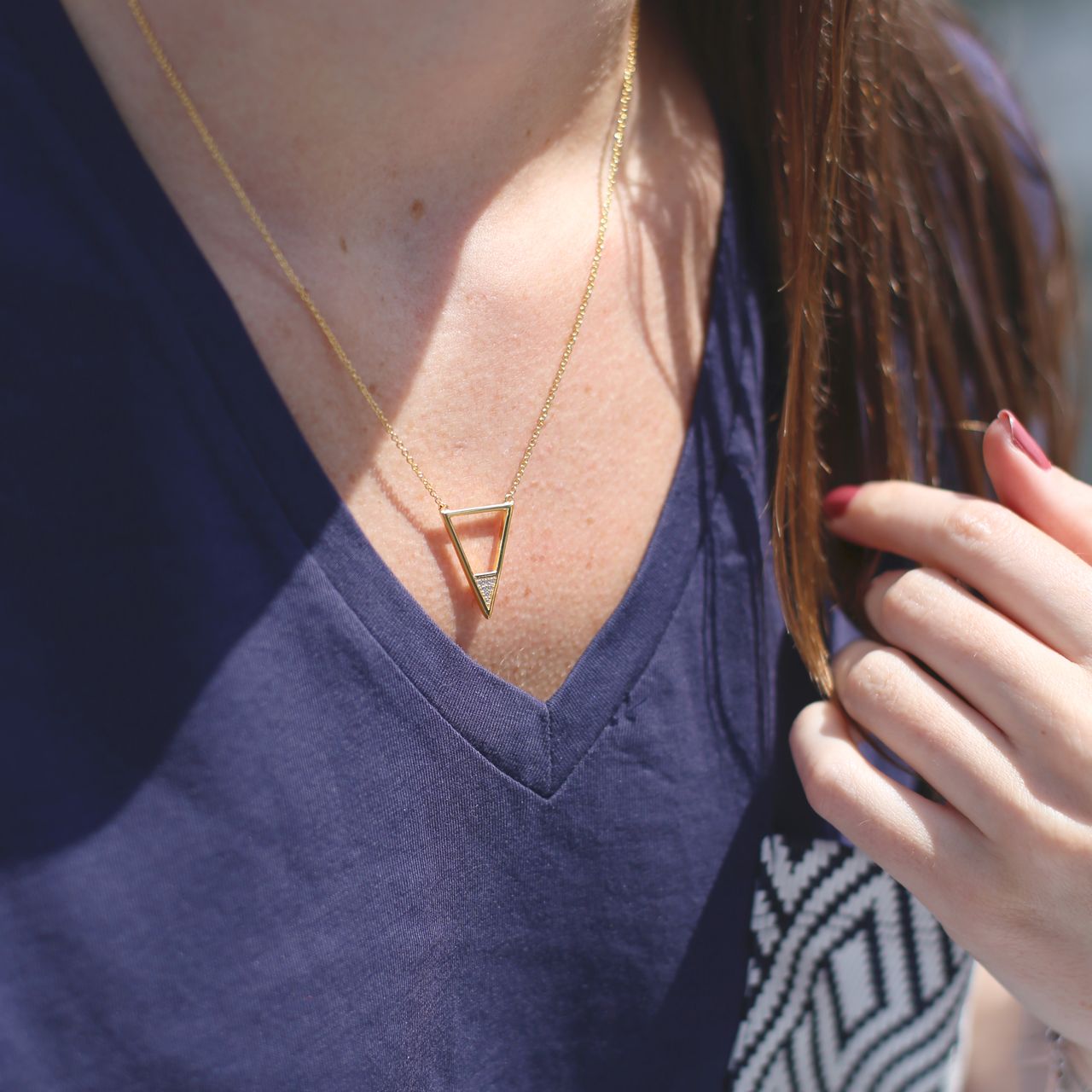 Goldplated ketting driehoek met zirkonia