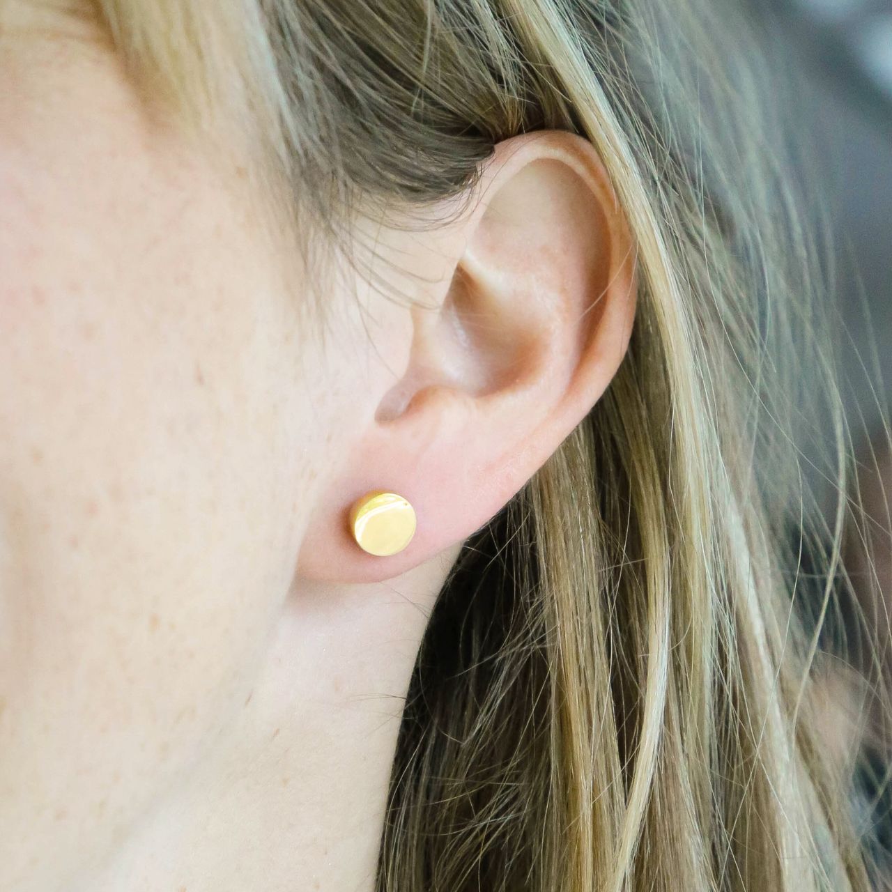 Goldplated oorbellen disc