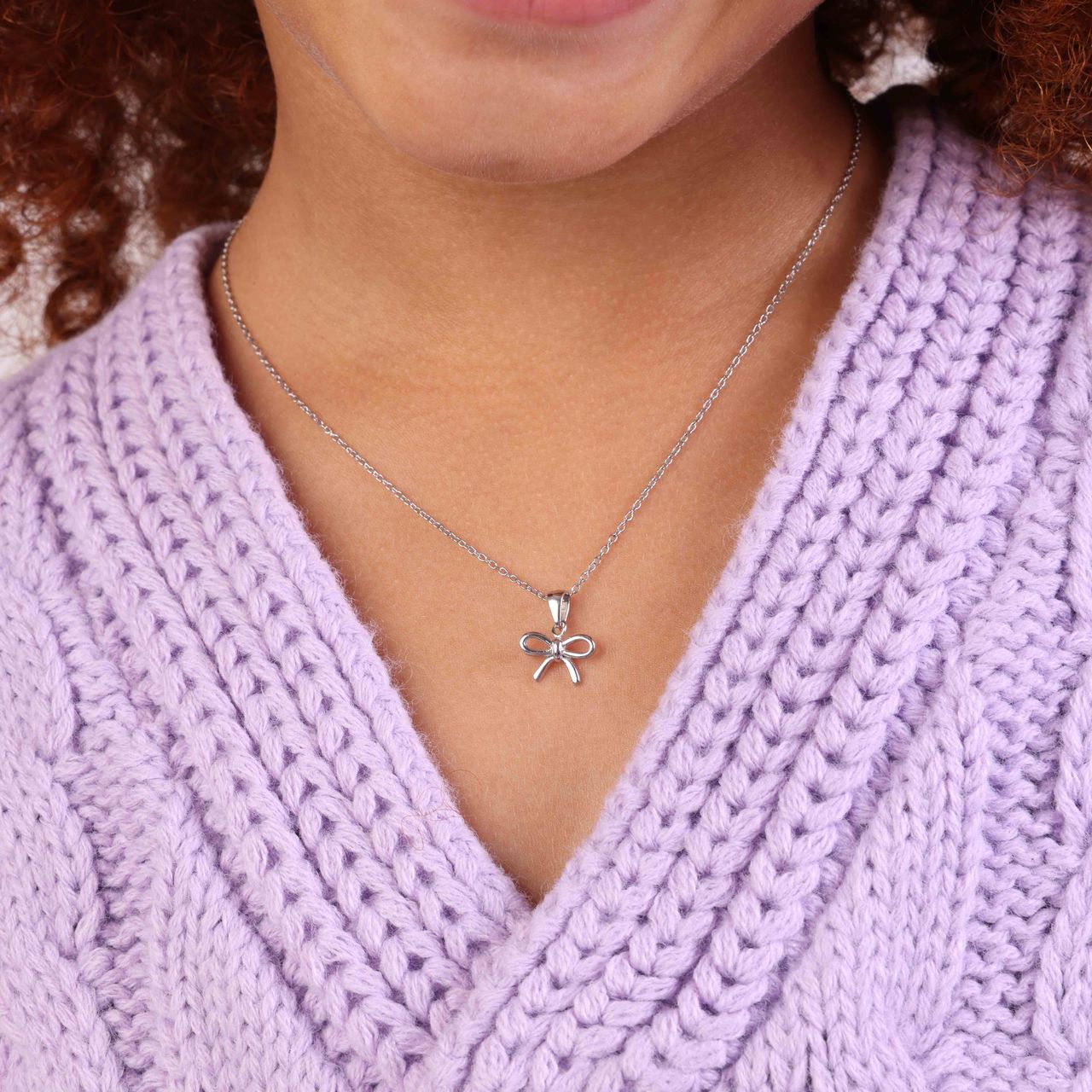 Zilveren kinderketting strik