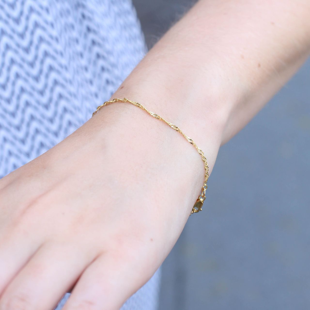 375 Gold gedrehtes Armband mit Gourmet-Gliedern
