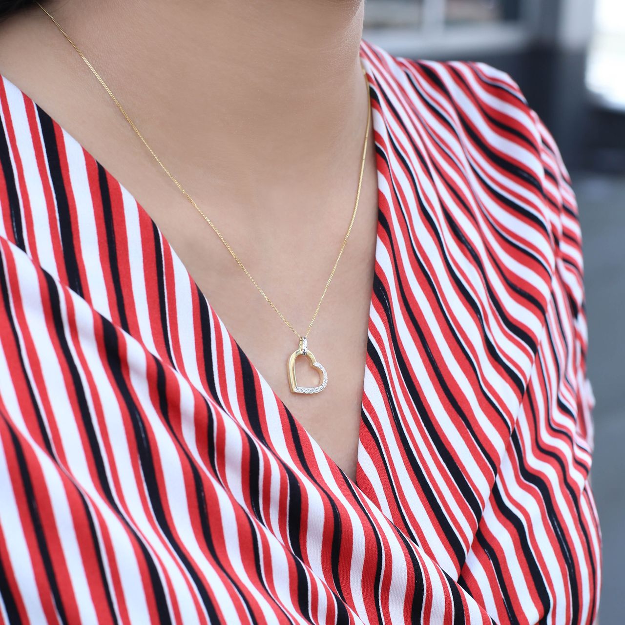 9 karaat bicolor ketting met hanger open hart voor dames