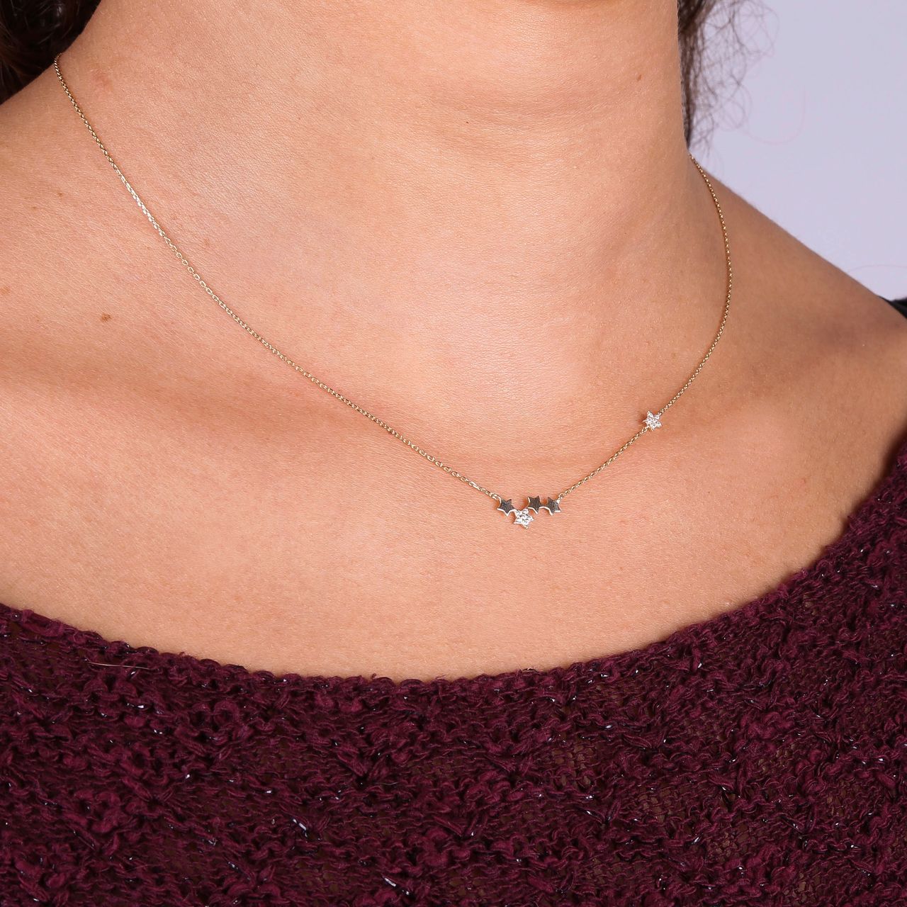 14 Karaat geelgouden ketting sterren met zirkonia