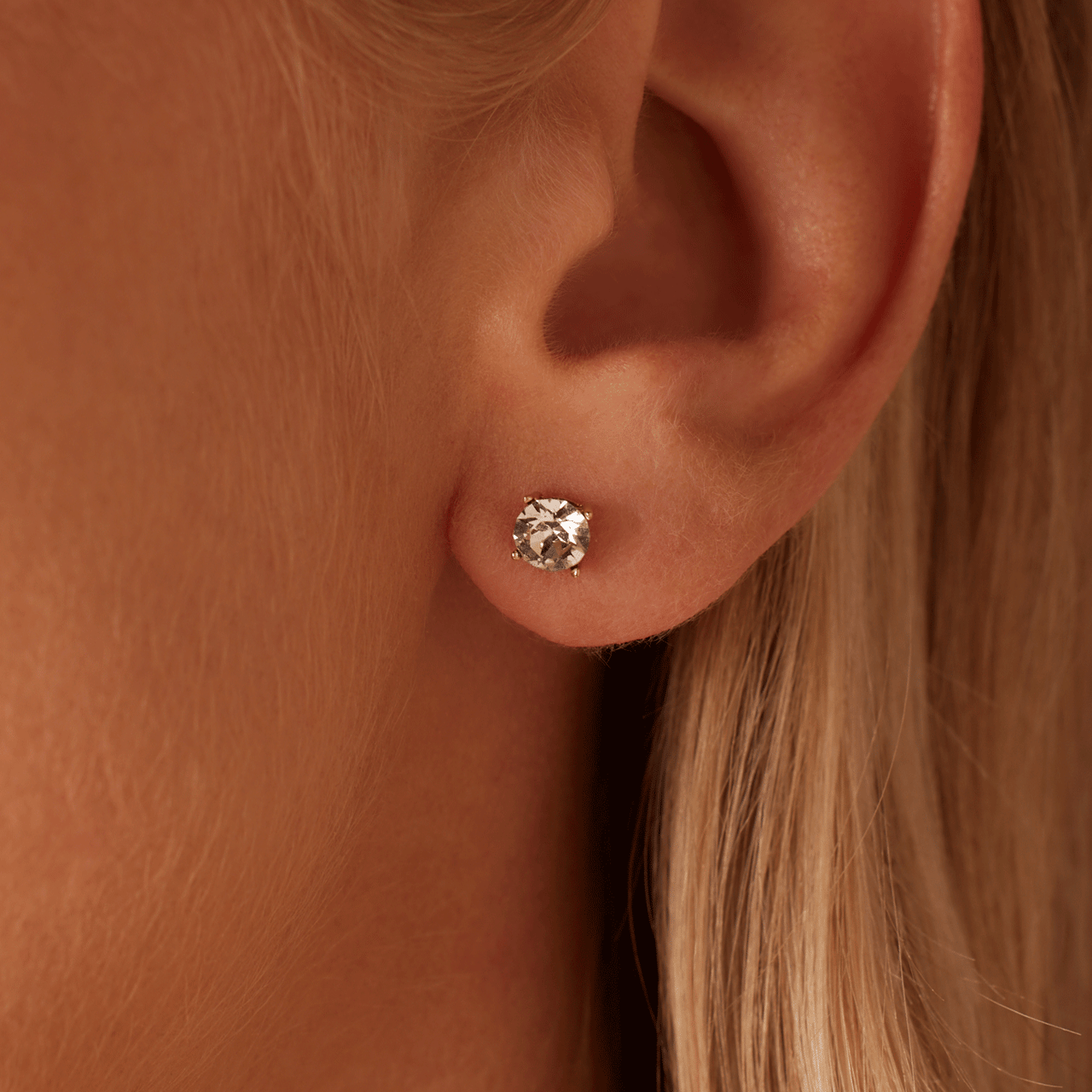 Zilveren oorknoppen goldplated kristal white voor dames
