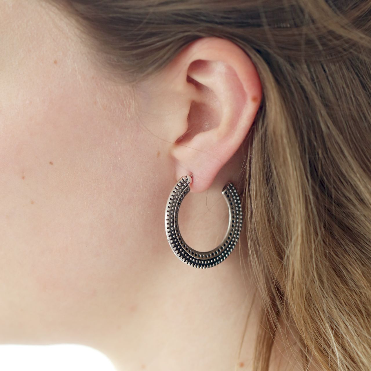 Zilverkleurige byoux oorringen boho