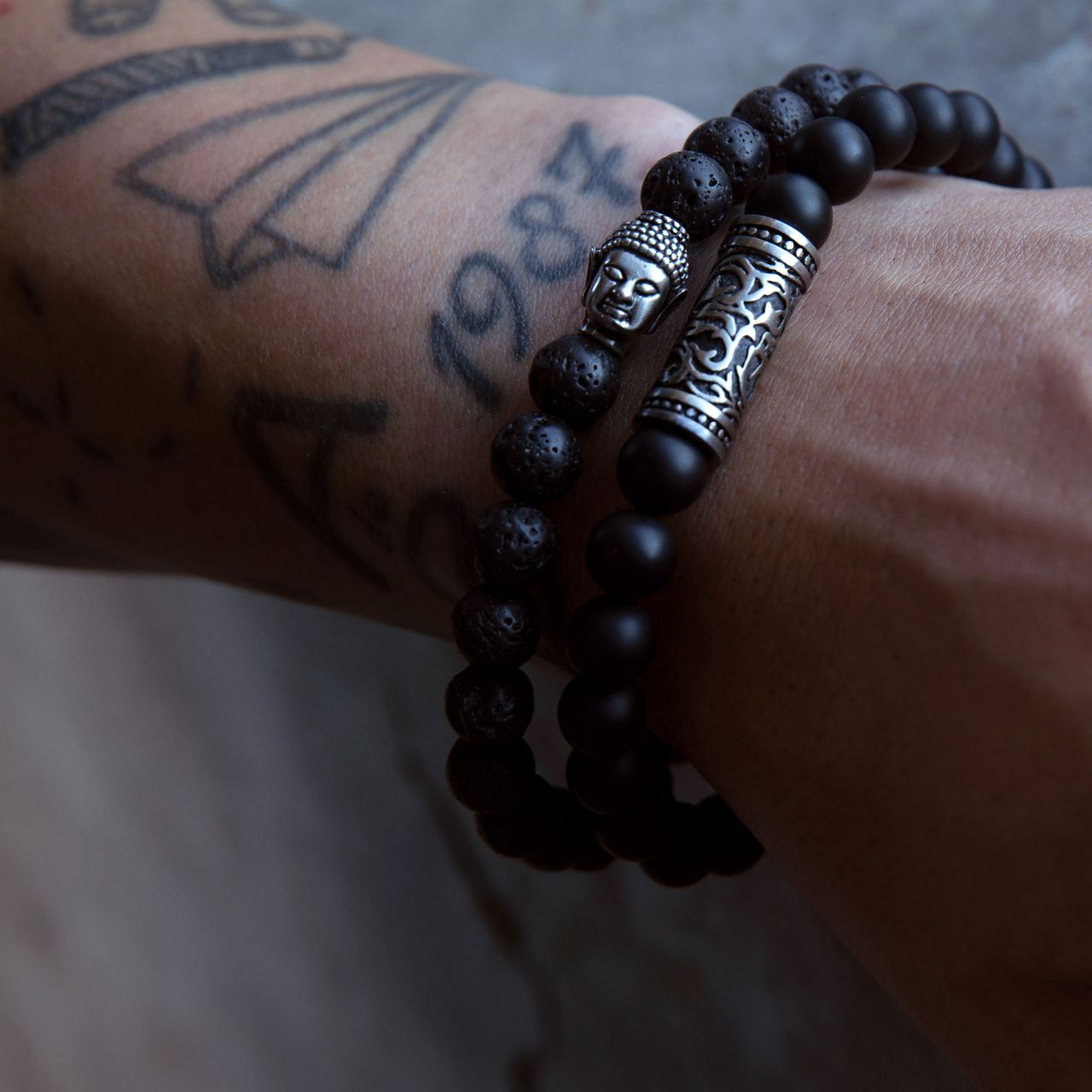 Stainless steel armband met lava stenen boeddha