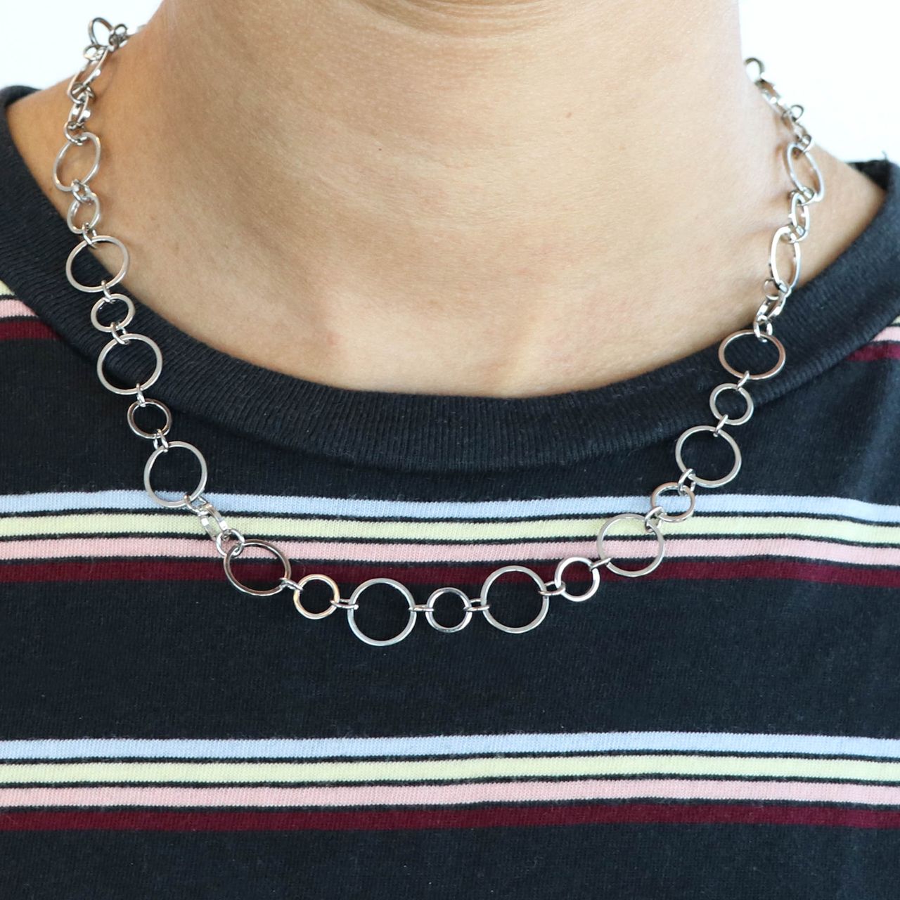 Zilverkleurige byoux ketting met ringen