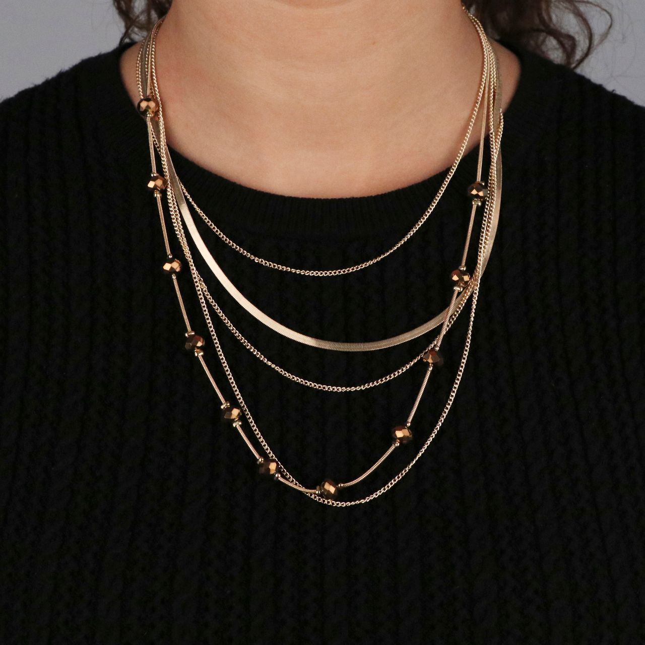 Goudkleurige byoux ketting multil layer