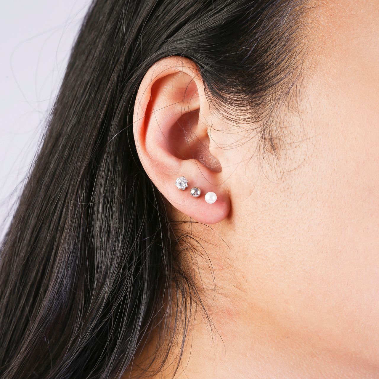 Zilverkleurige byoux set met parel oorknoppen