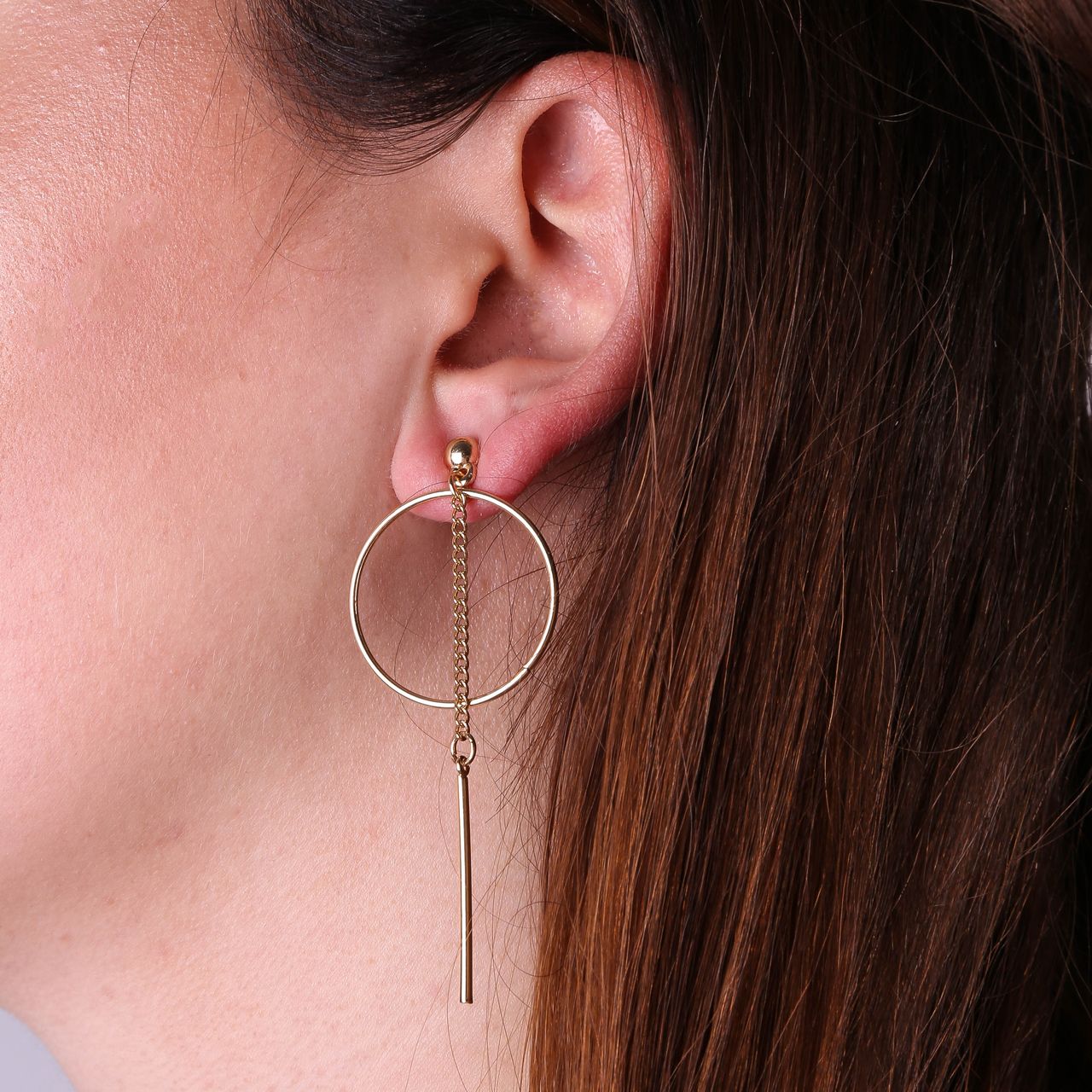 Goudkleurige byoux oorknoppen