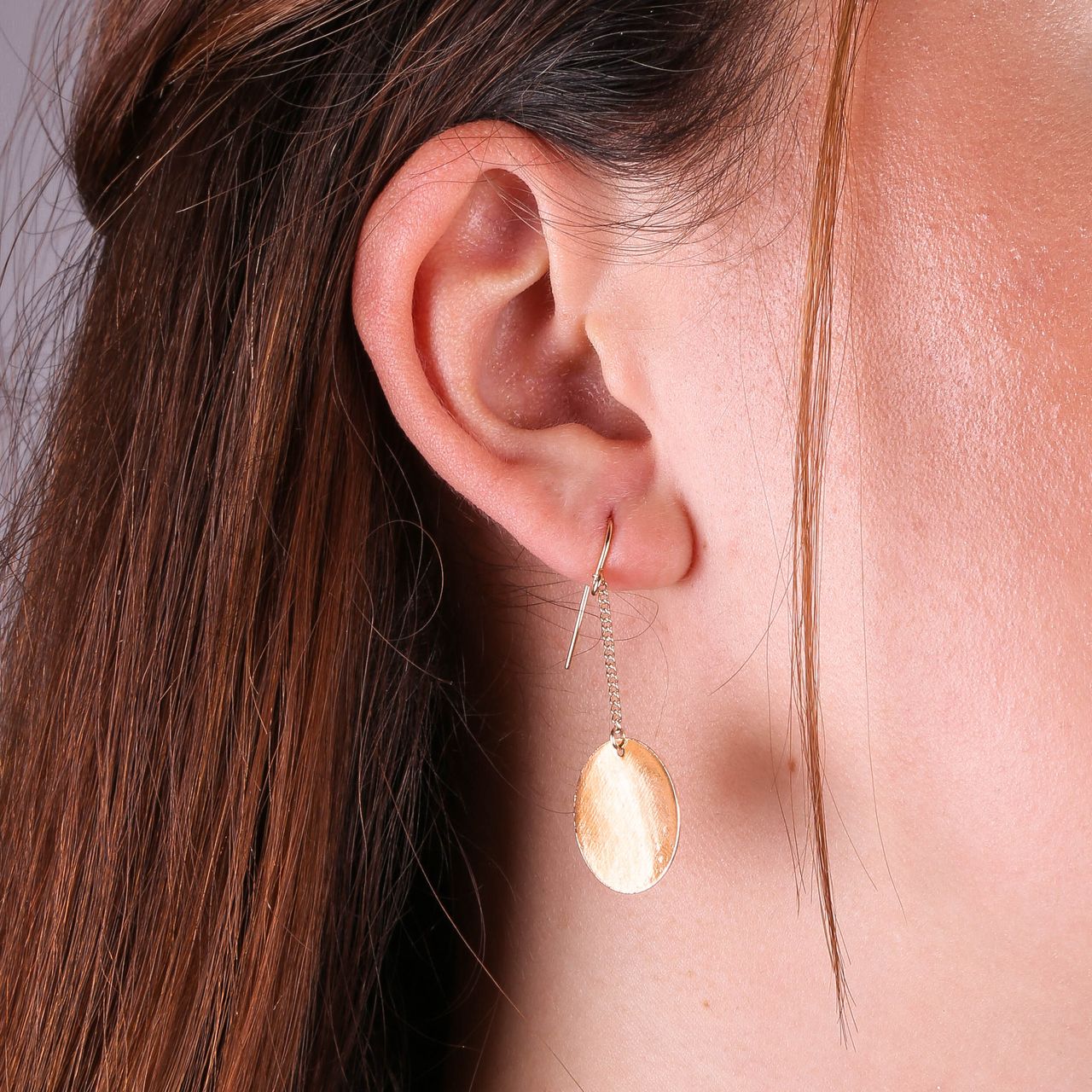 Bijoux goudkleurige oorknoppen munt voor dames