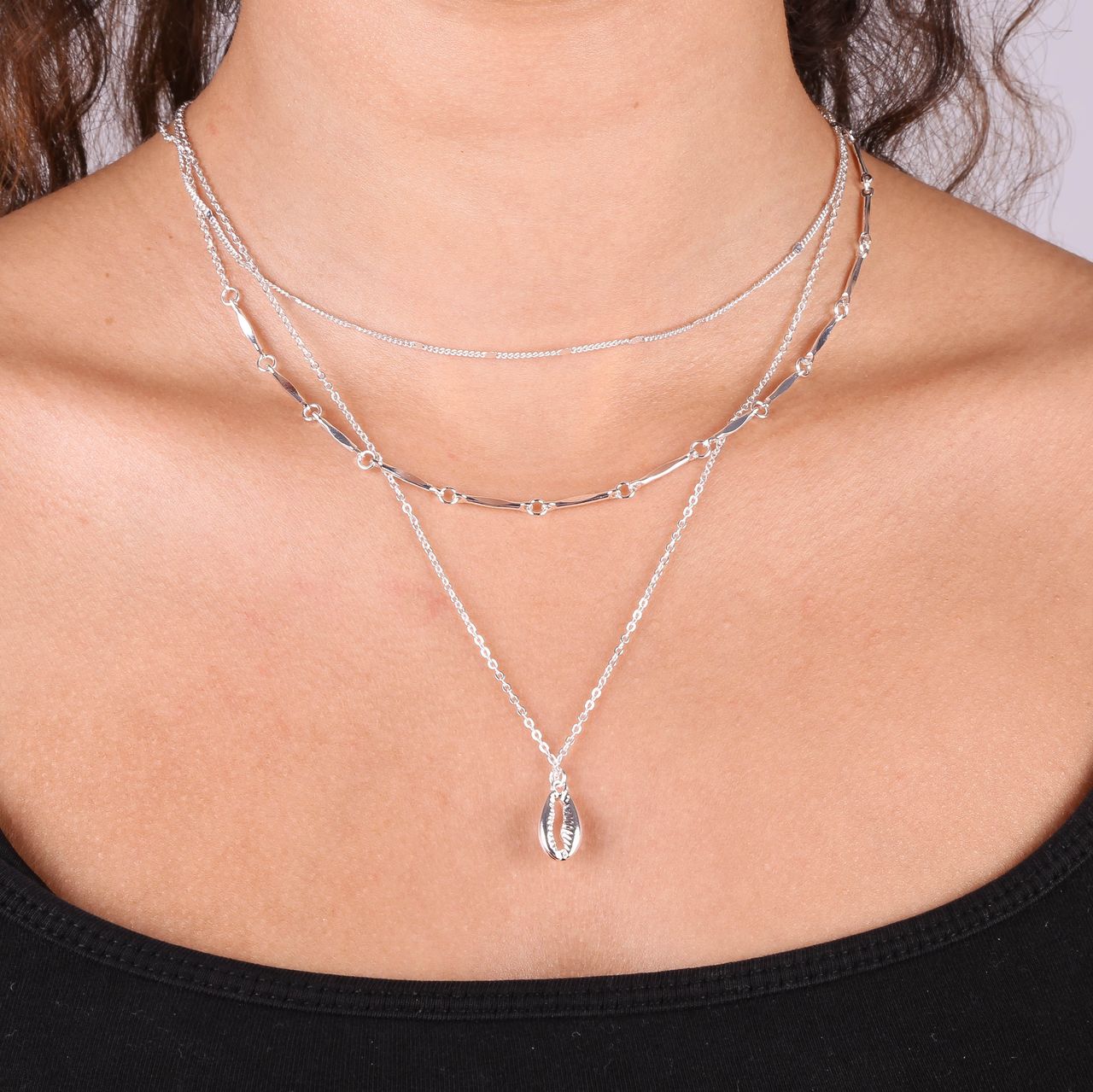 Zilverkleurige byoux ketting multi met schelp