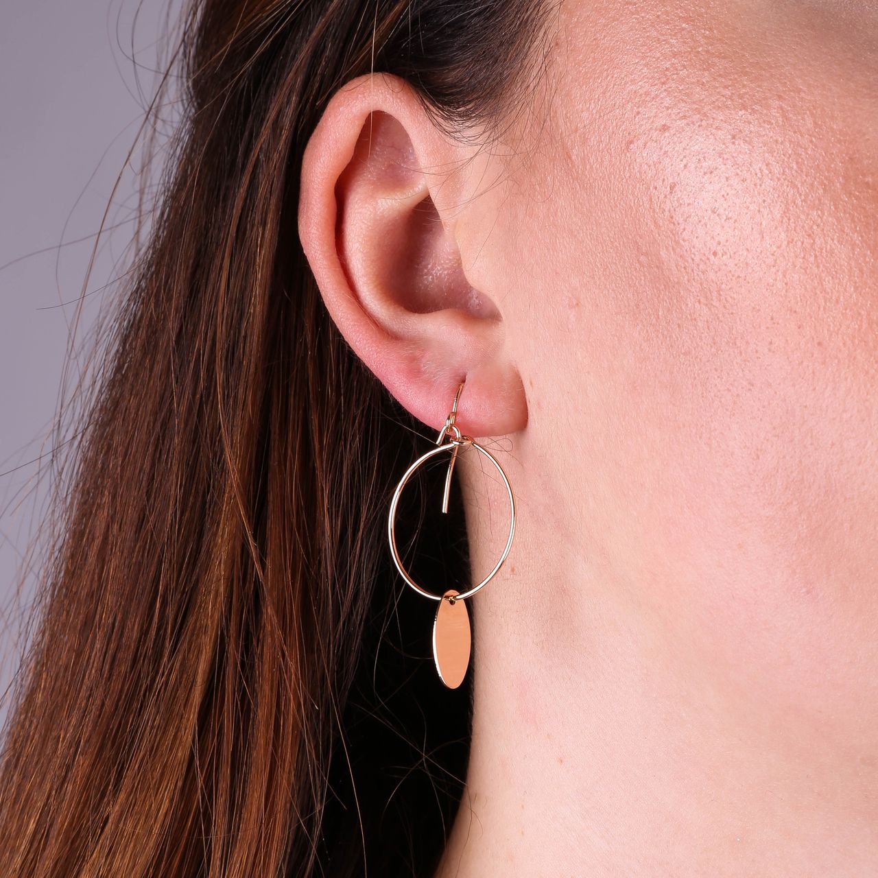 Goudkleurige byoux oorringen met hanger