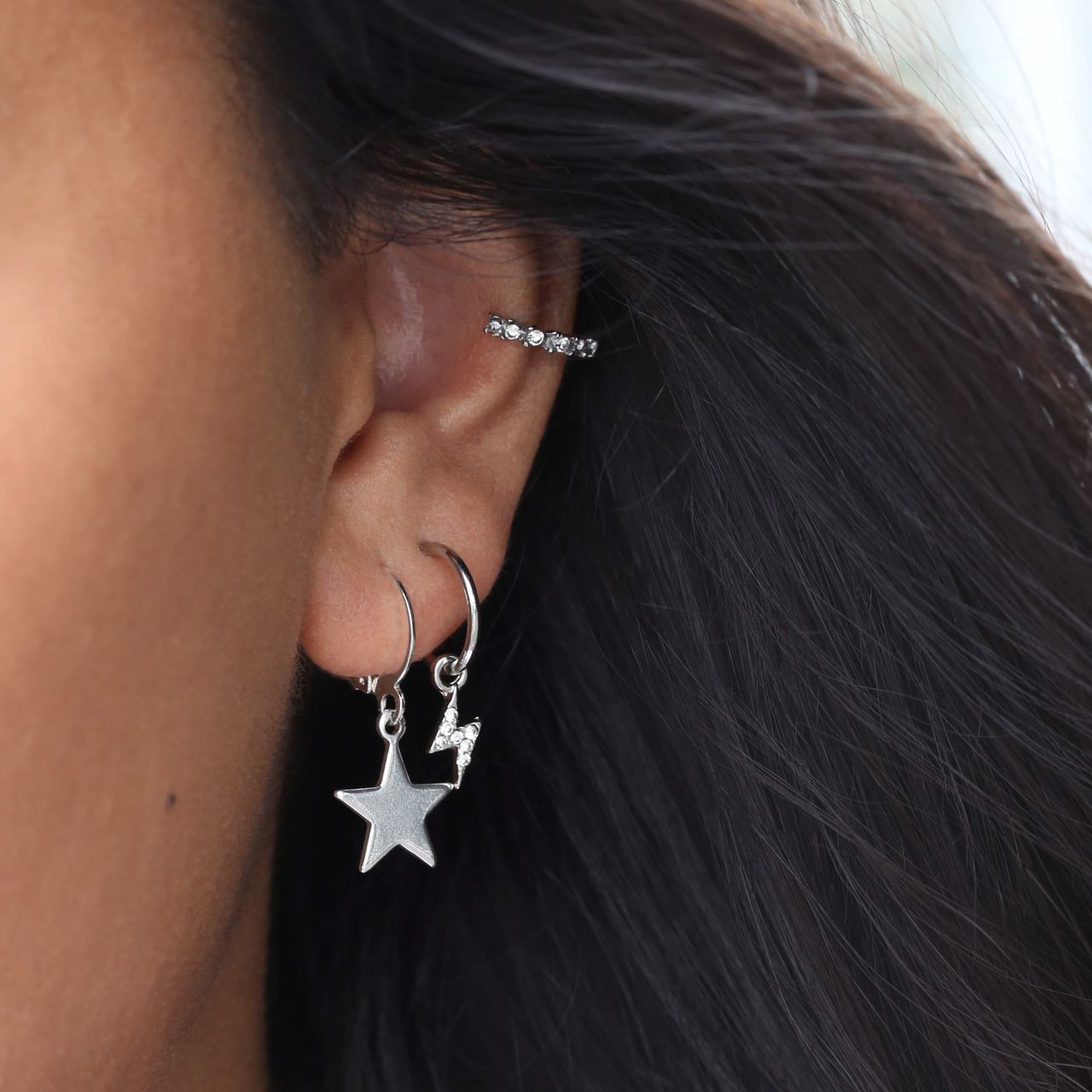 Zilverkleurige bijoux oorbellen ster