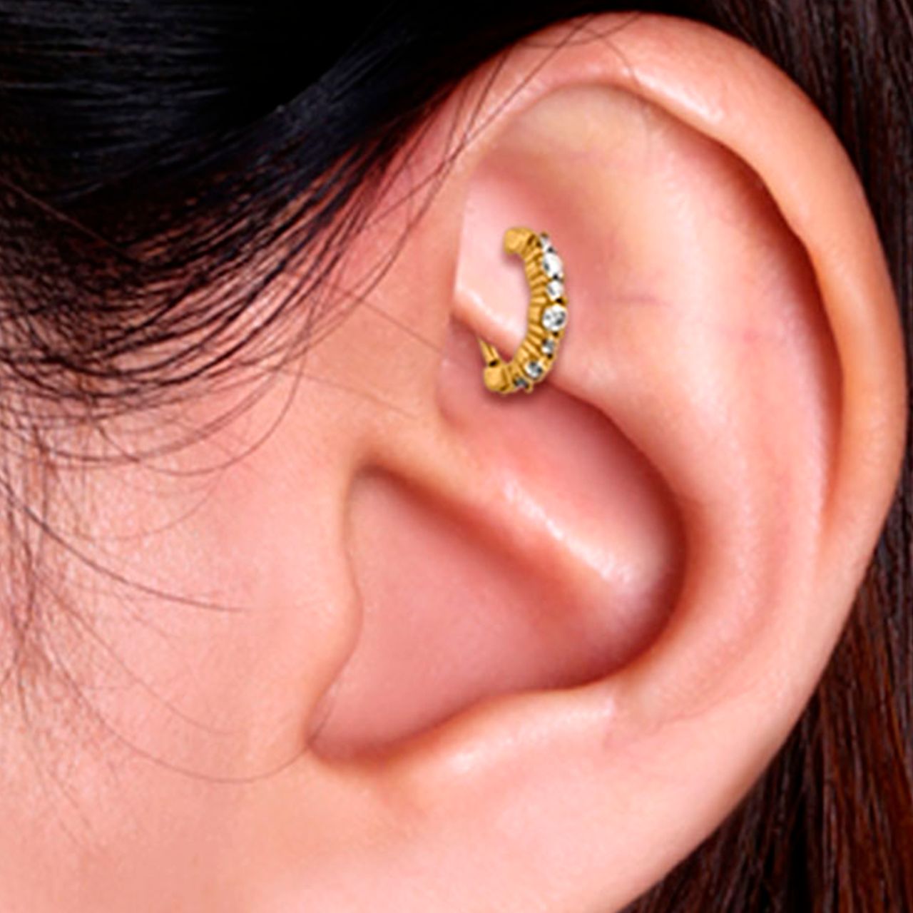 Stalen helixpiercing goldplated clicker kristal