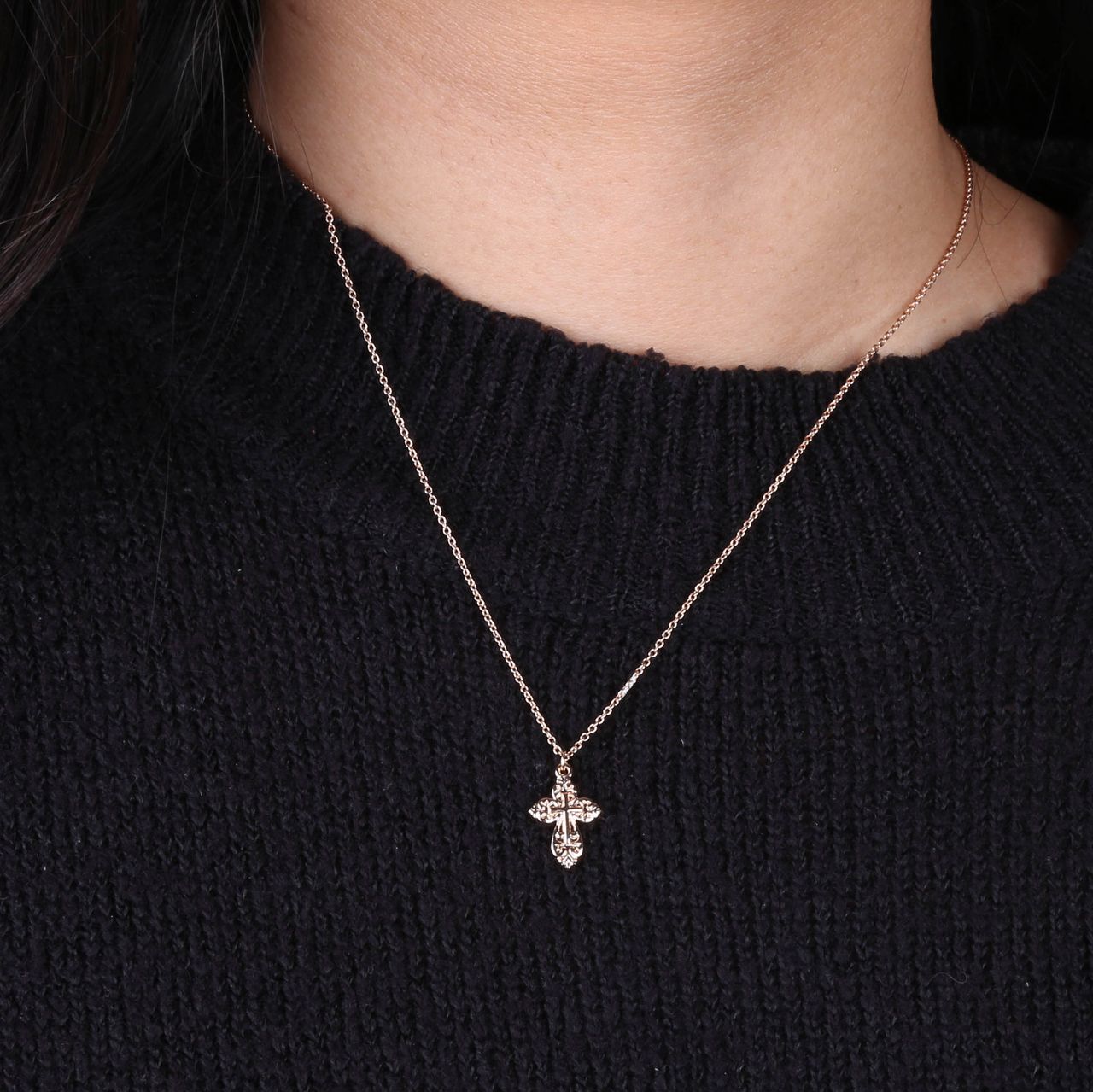 Goudkleurige byoux ketting met hanger kruis