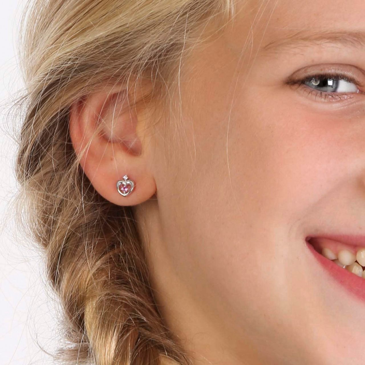 Zilveren kinderoorbellen hart met roze zirkonia
