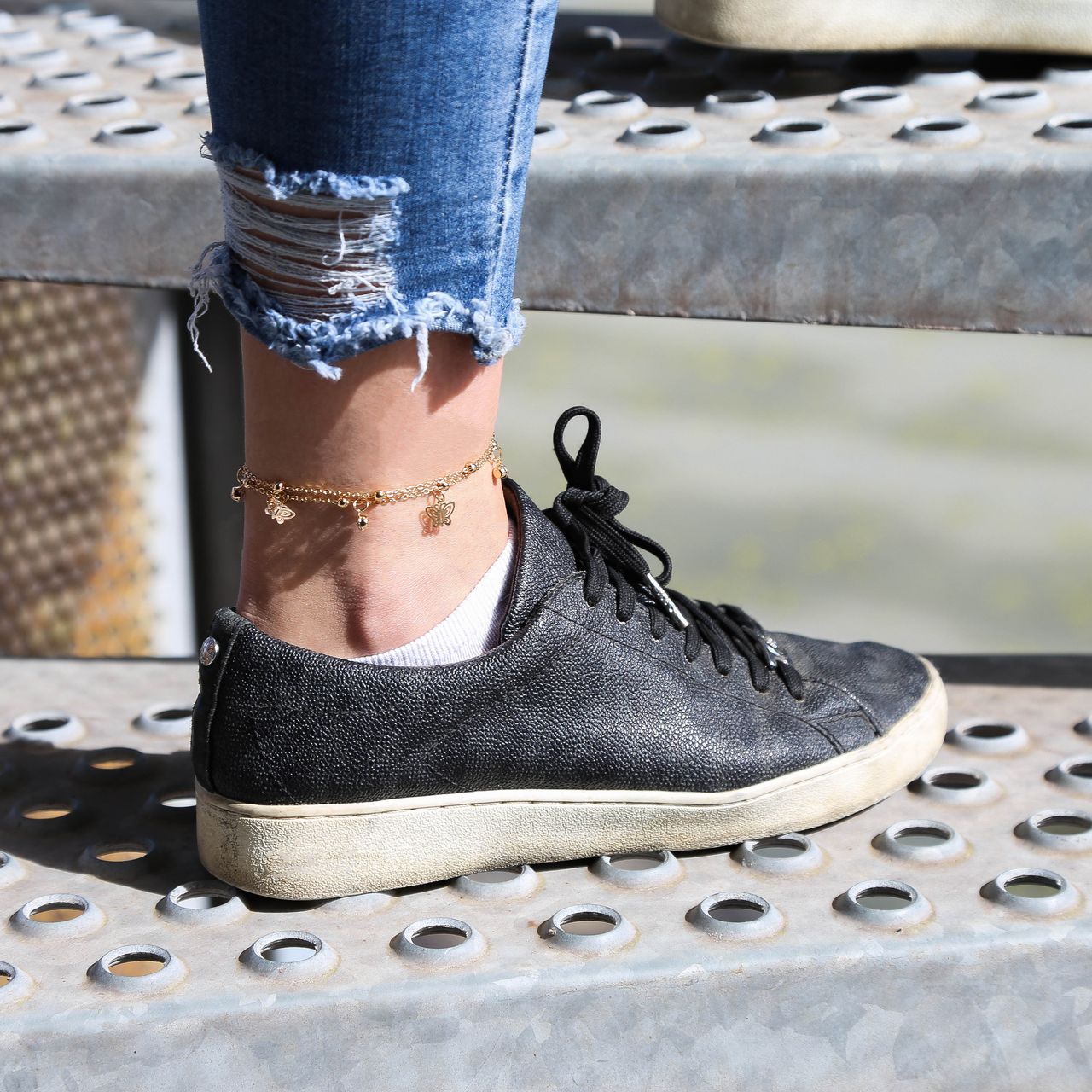 Goudkleurig byoux enkelbandje multi gedraaid