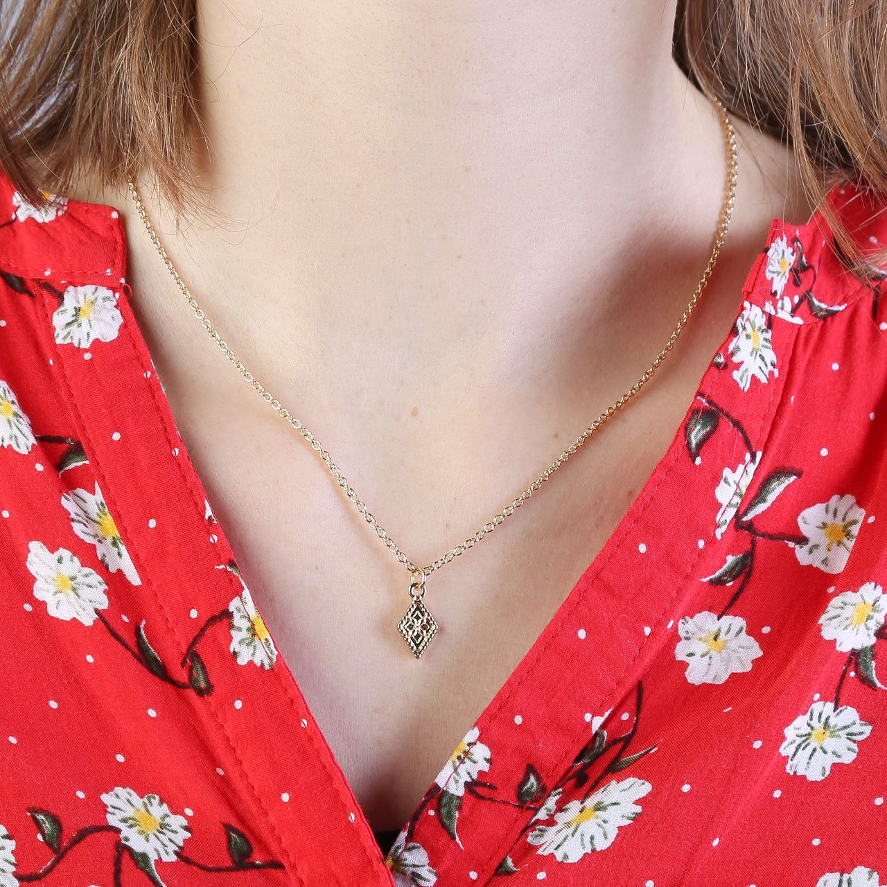 Goudkleurige byoux ketting met hanger ruit