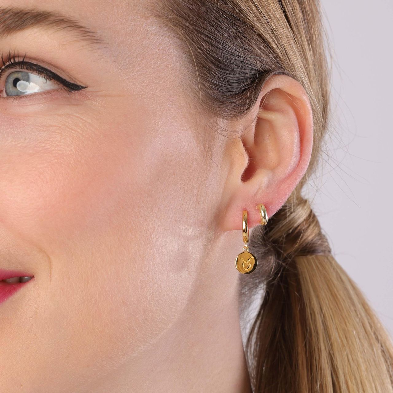 Zilveren goldplated oorringen sterrenbeeld voor dames