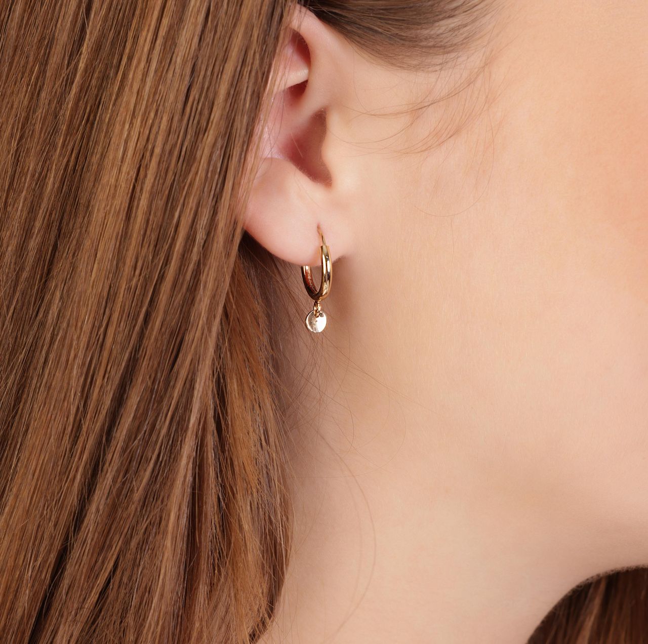 Goldplated oorbellen met hanger rond