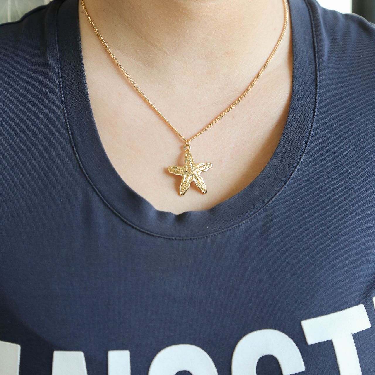 Goudkleurige bijoux ketting met hanger zeester voor dames