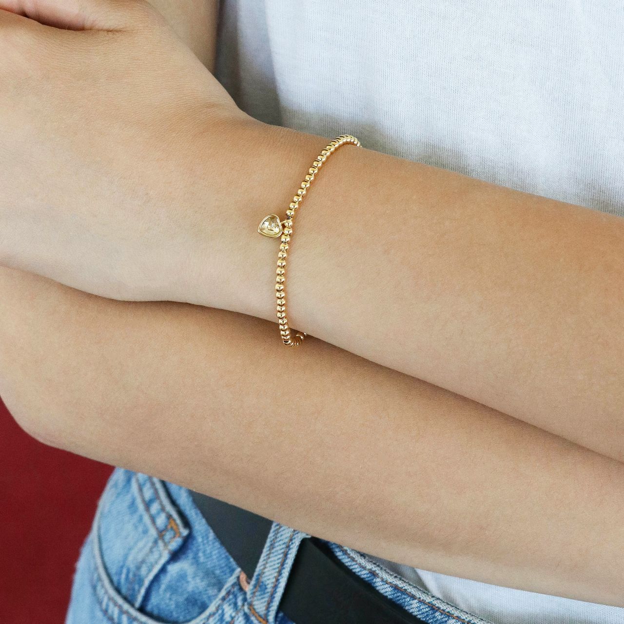 Gerecycleerd stainless steel armband gold bol/hart colorado kristal