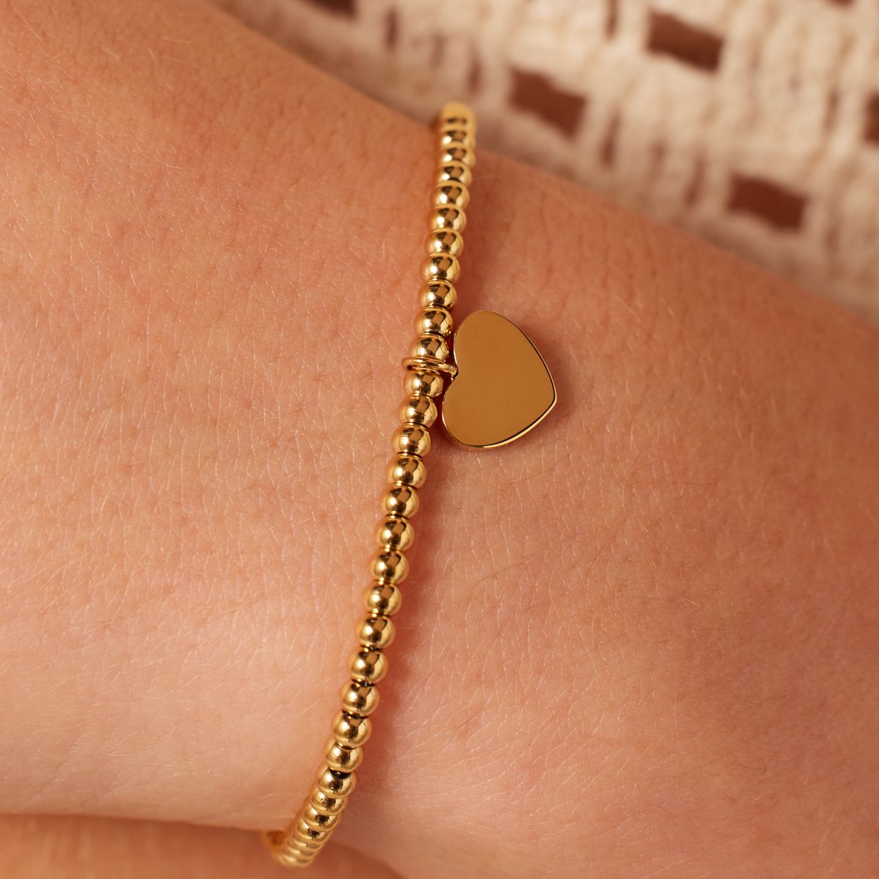 Gerecycleerd stainless steel armband gold bol/hart