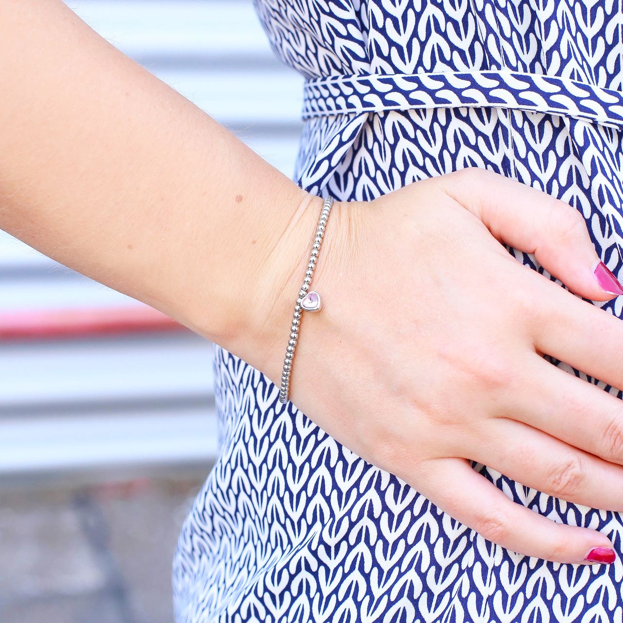 Gerecycleerd stainless steel armband bol/hart licht roze kristal