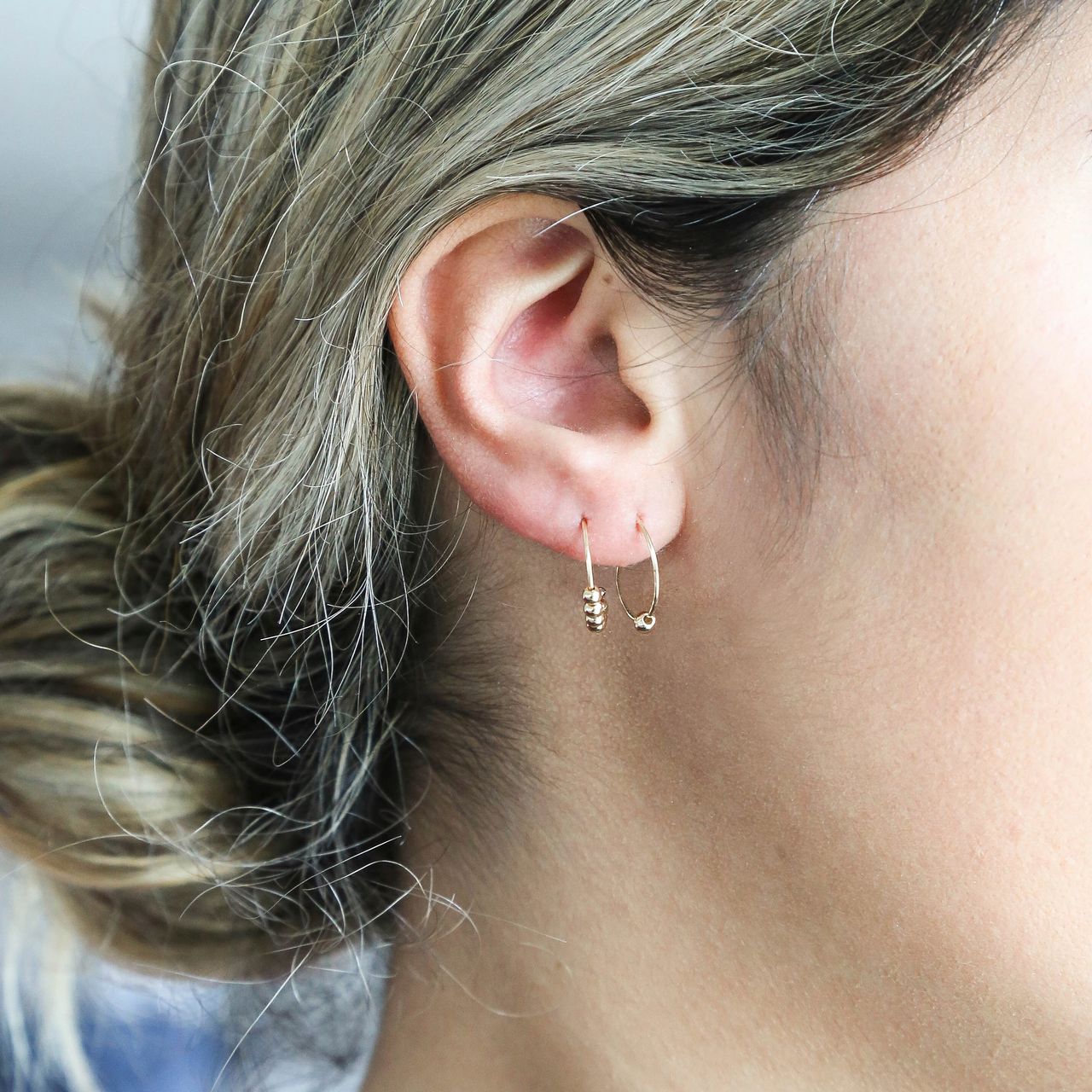 Goudkleurige byoux oorringen bedeltjes