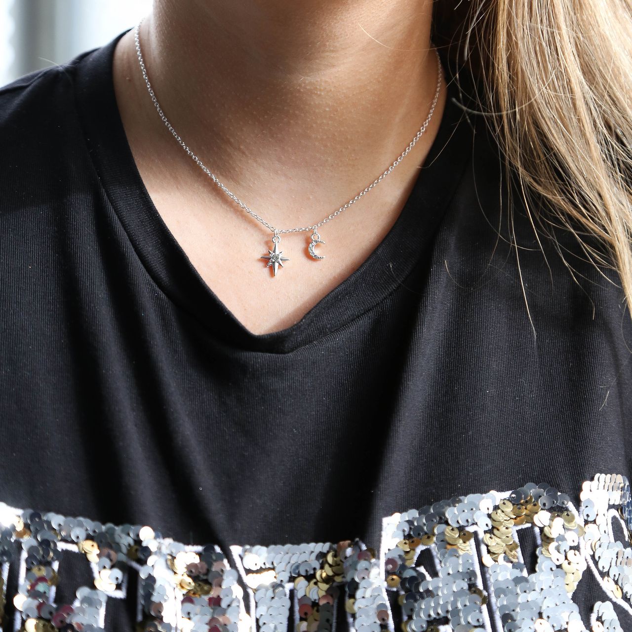 Zilverkleurige byoux ketting met ster en maan