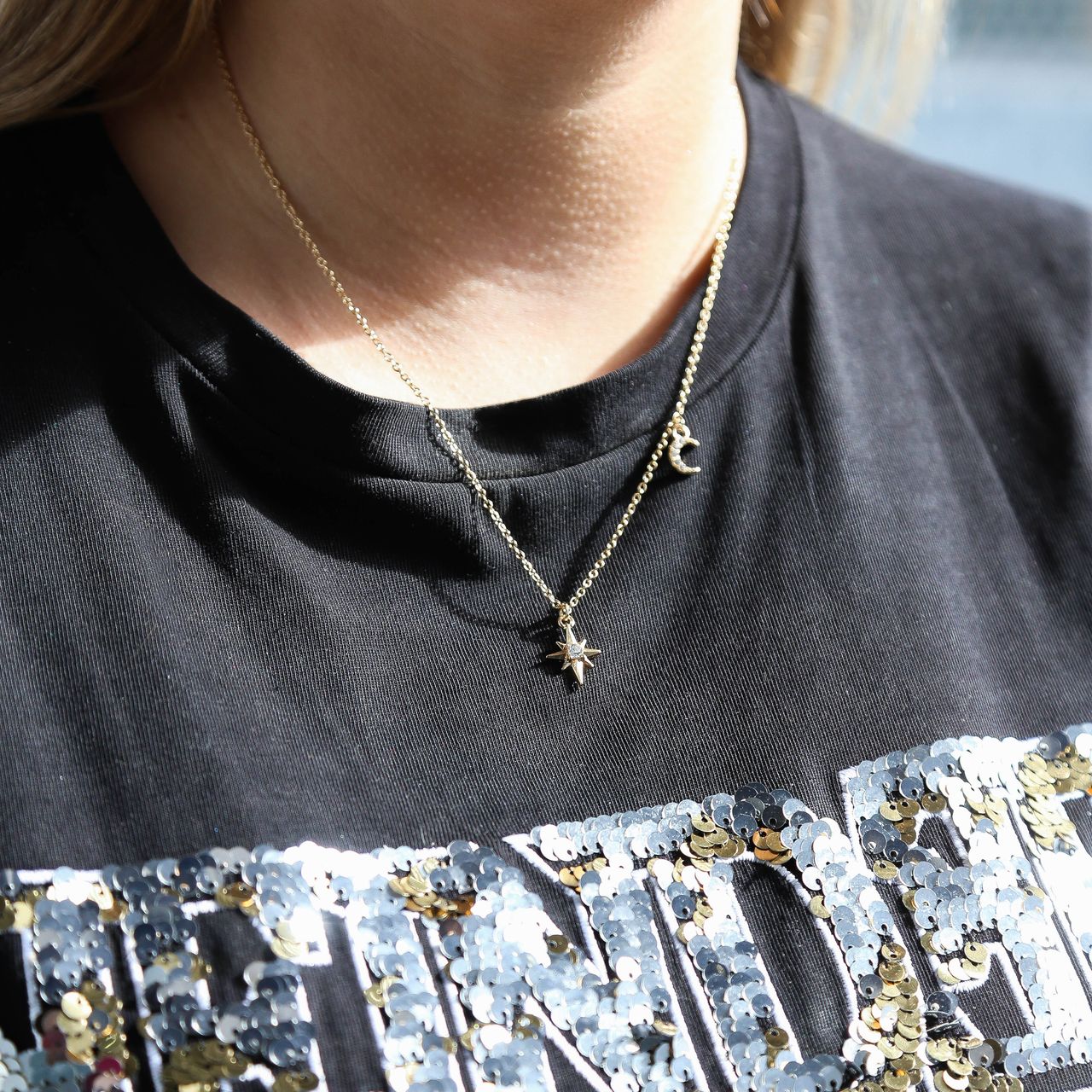 Goudkleurige byoux ketting met ster en maan