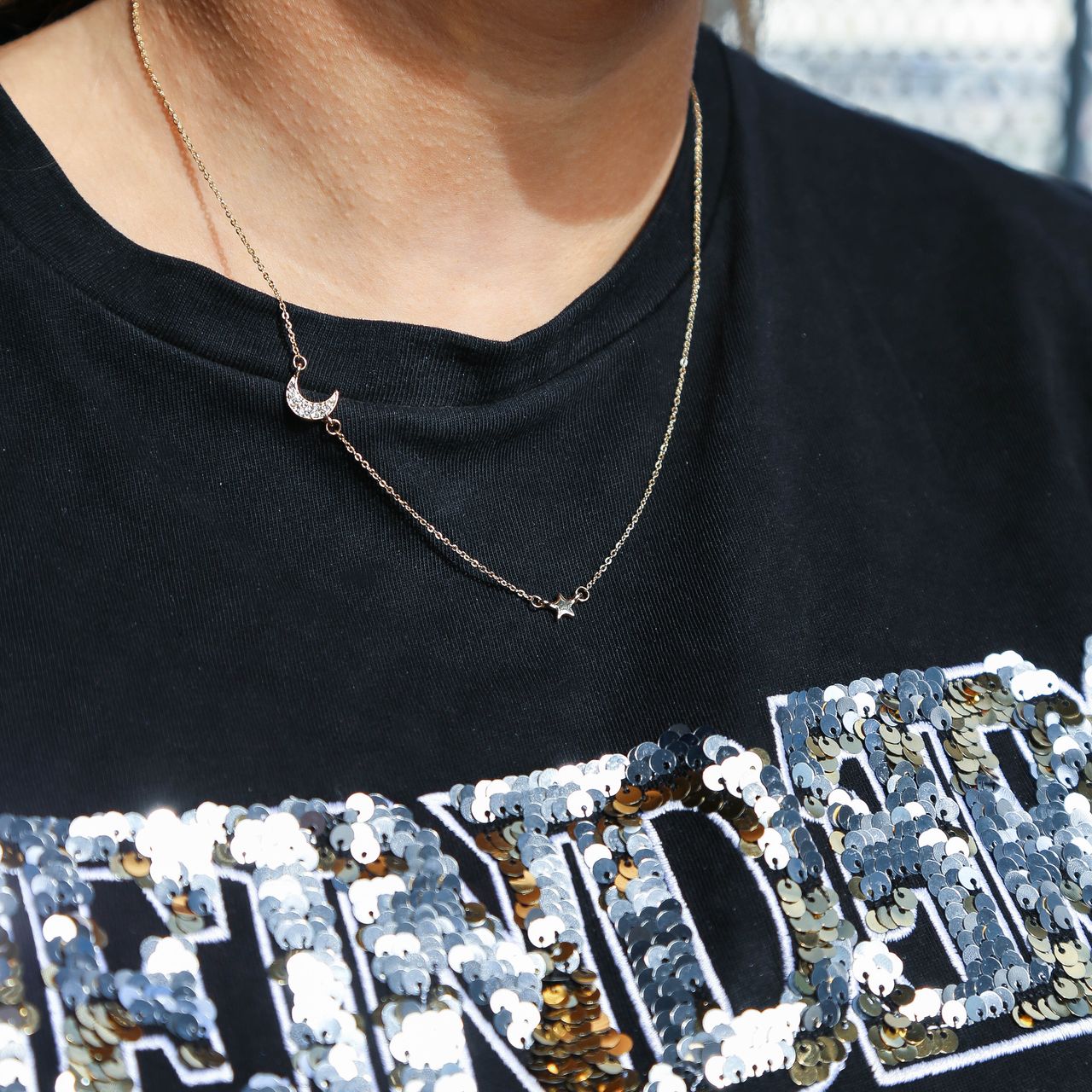 Goudkleurige bijoux ketting met maan en ster