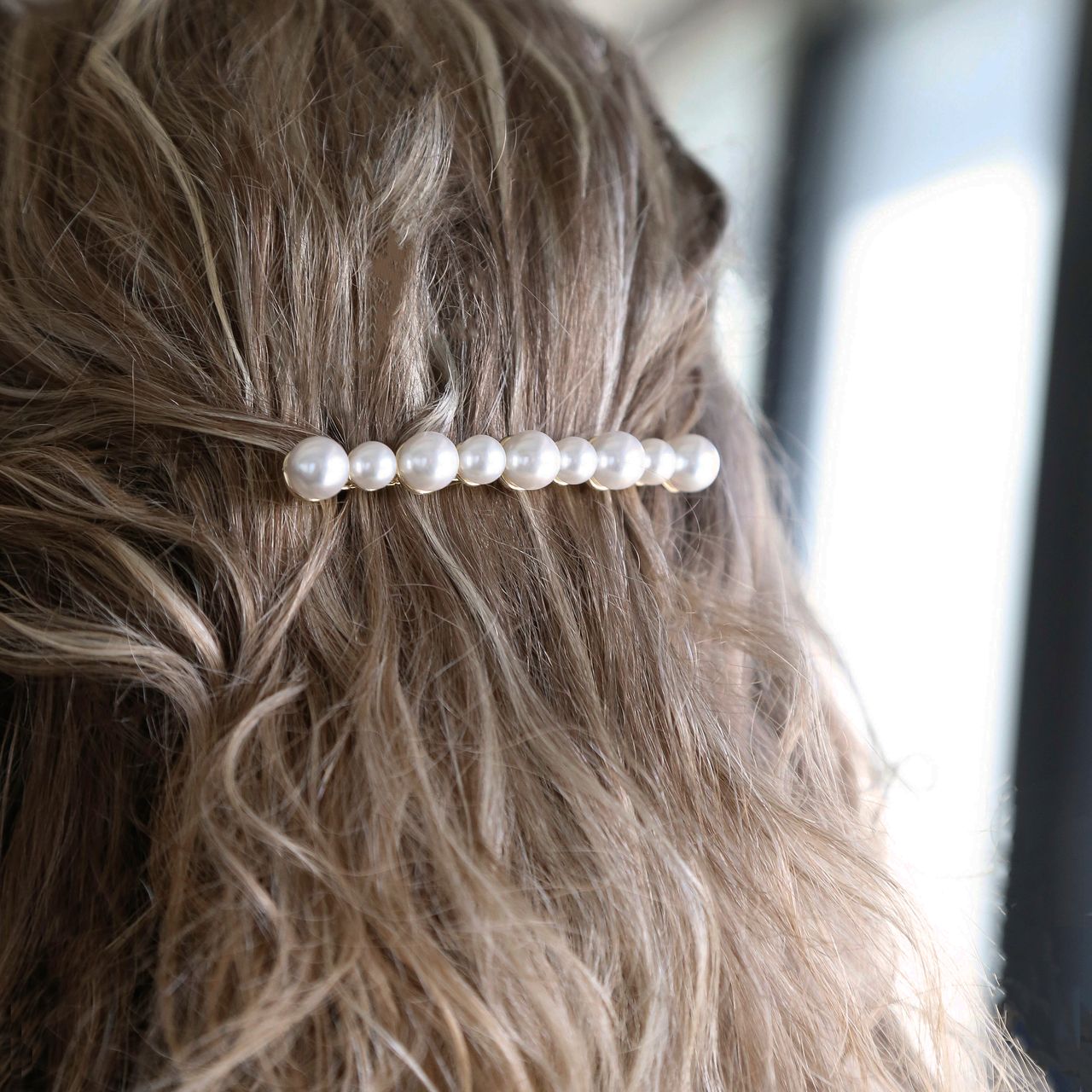 Zilverkleurig haar accessoire met parels