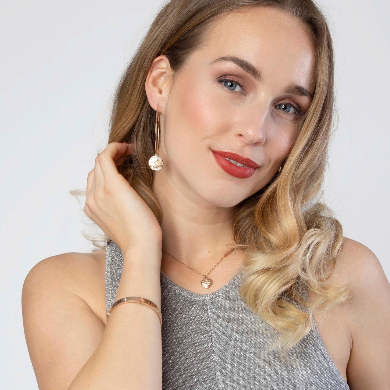 Guess stalen roséplated bangle met kristal voor dames