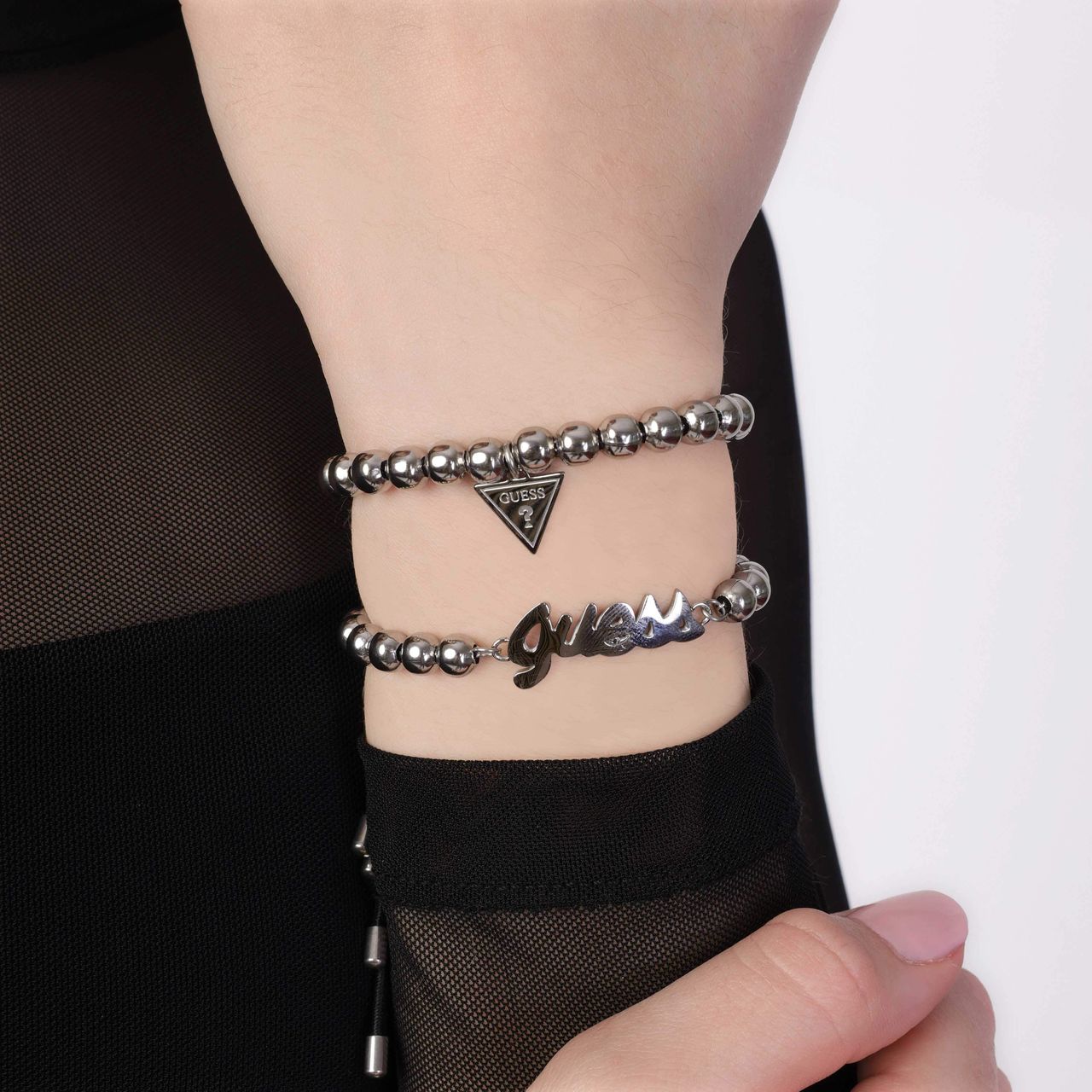 Guess stainless steel koord armband triangle